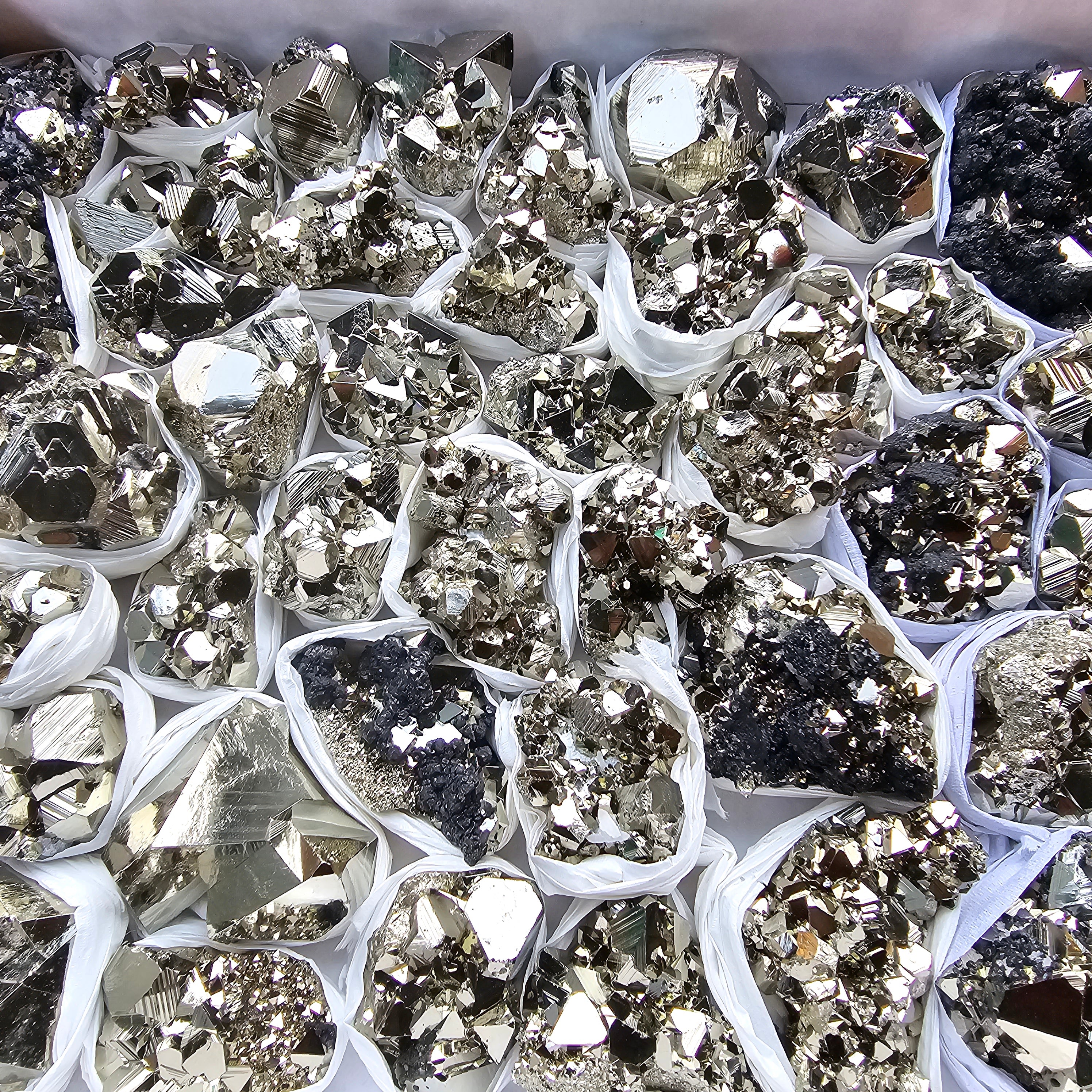 Box 52 pcs big pyrite Octahedral