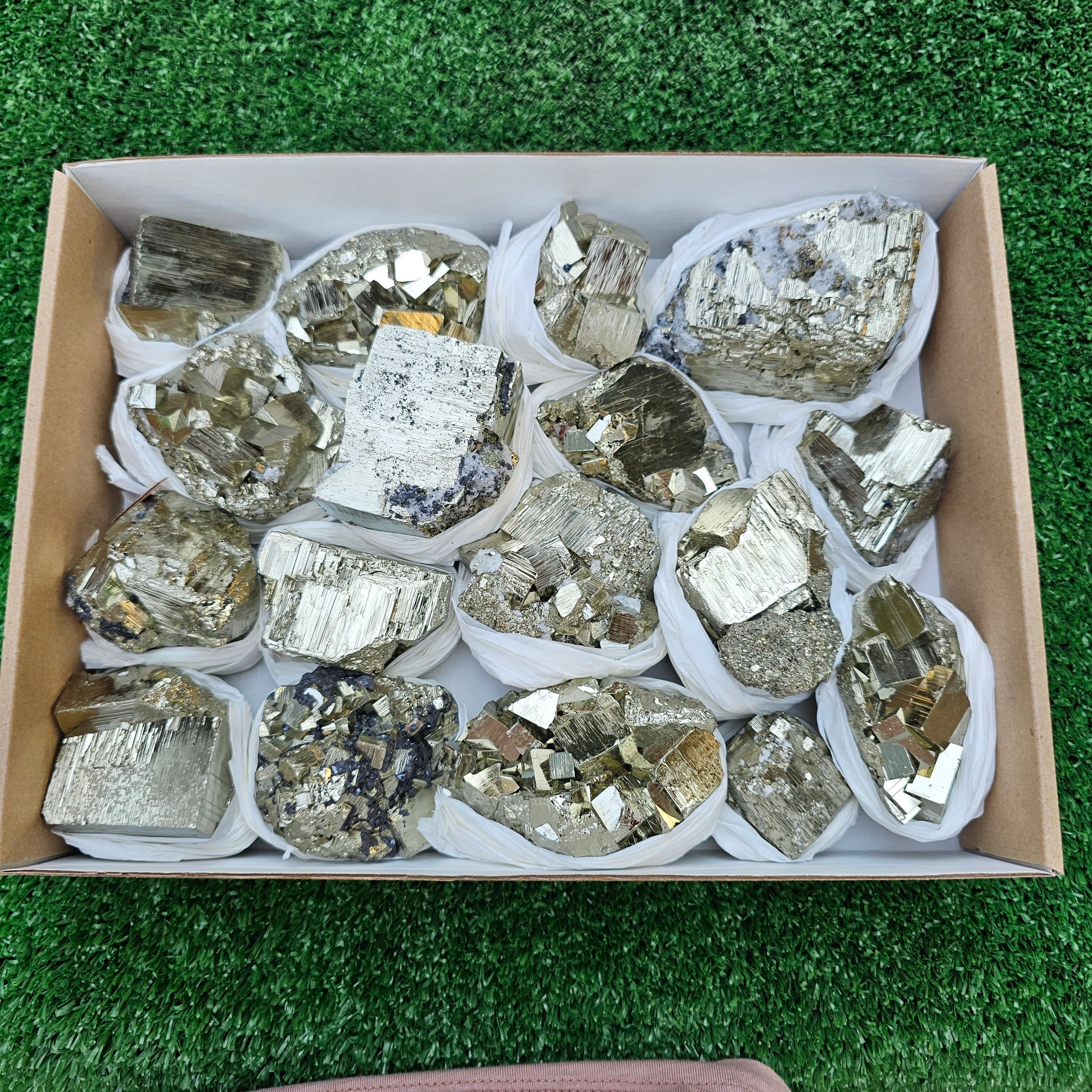 17 pc Pyrite Cubic with calcite flourecent