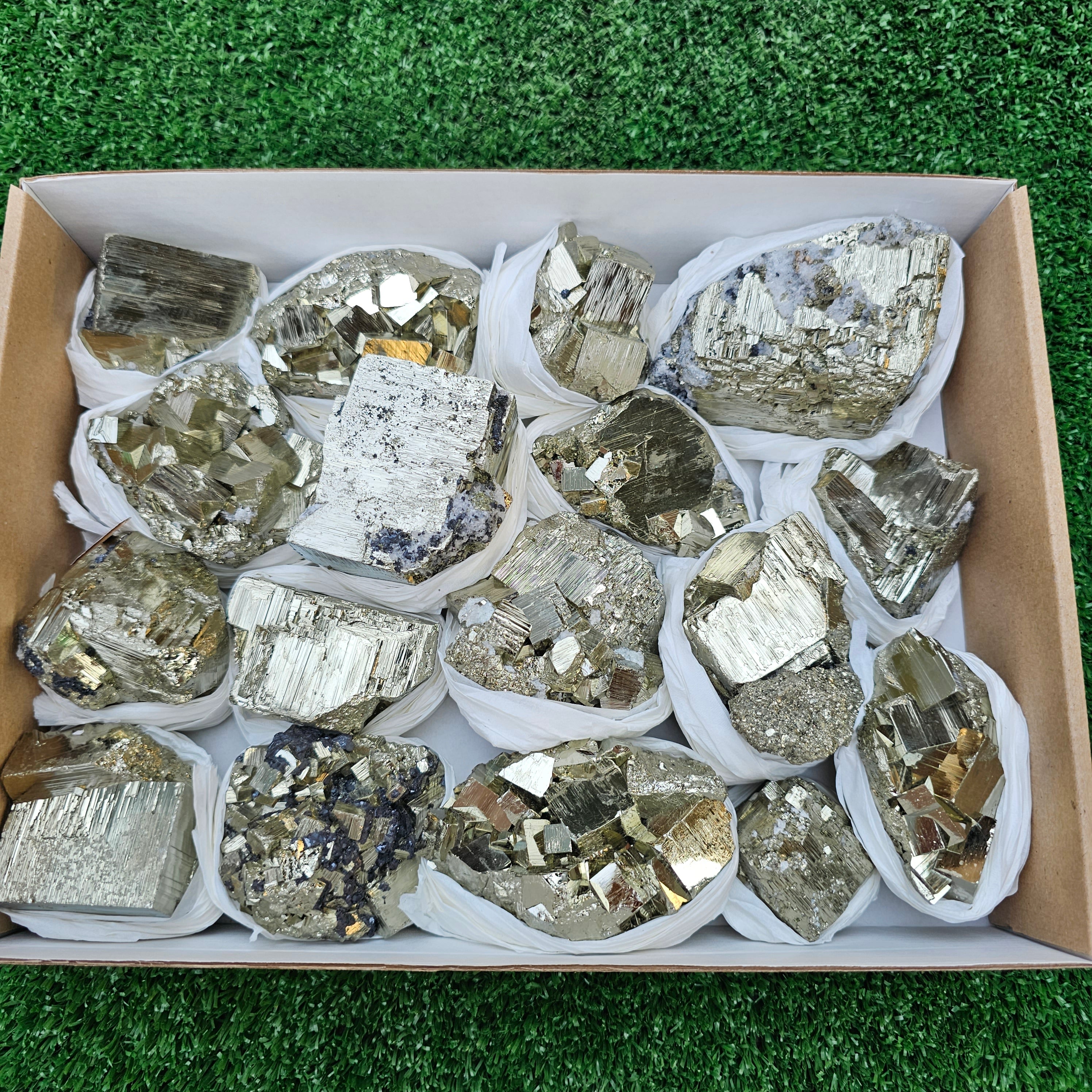 17 pc Pyrite Cubic with calcite flourecent