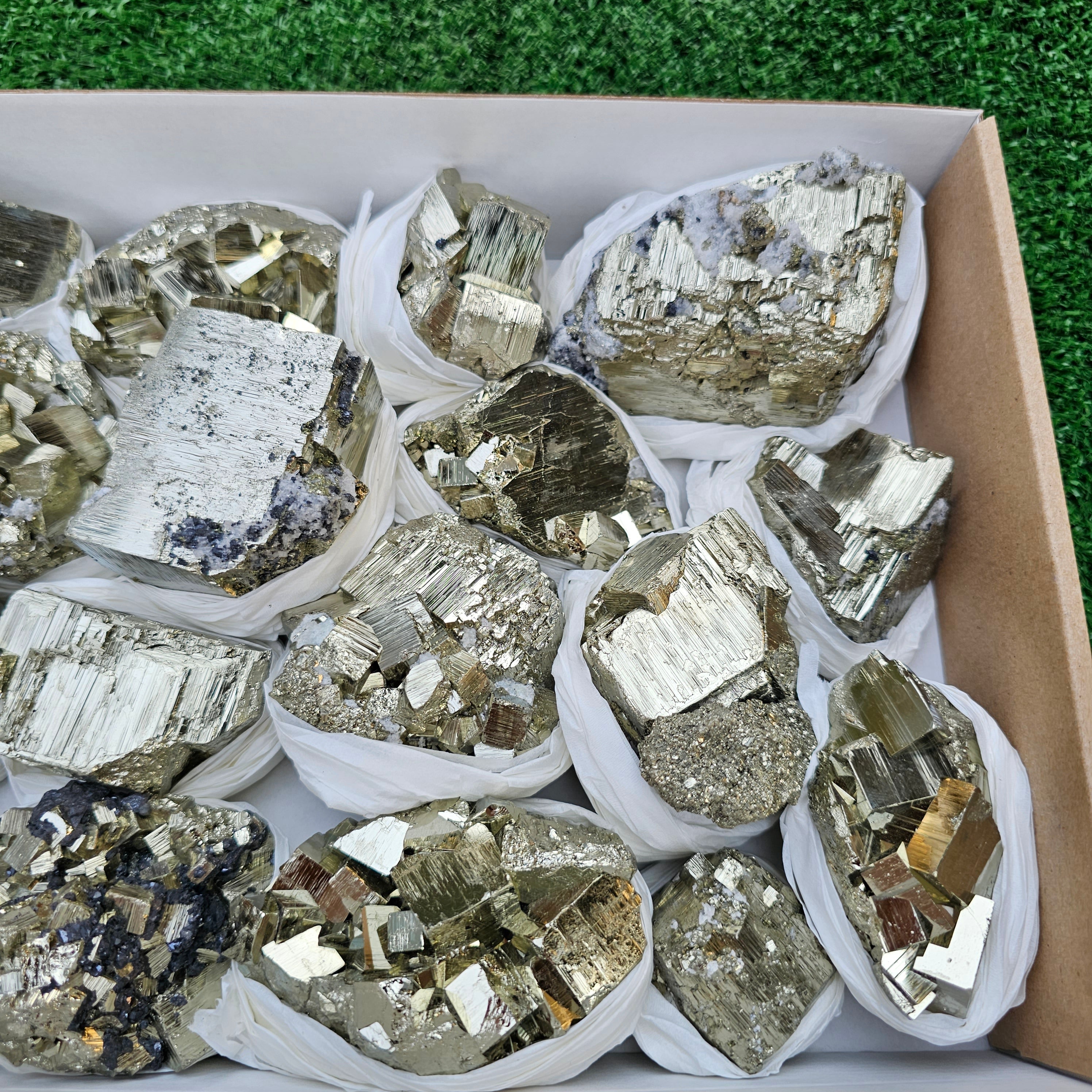 17 pc Pyrite Cubic with calcite flourecent