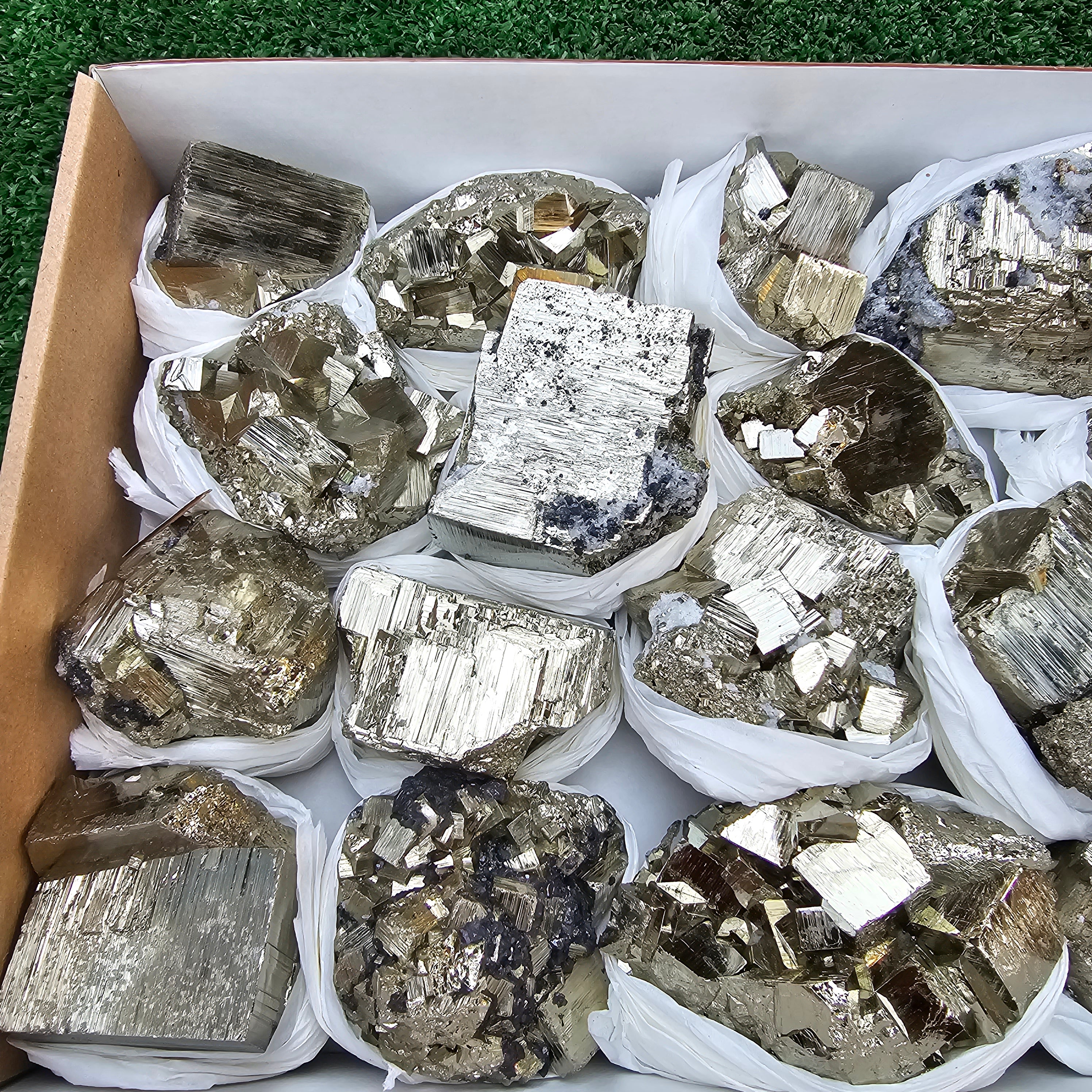 17 pc Pyrite Cubic with calcite flourecent