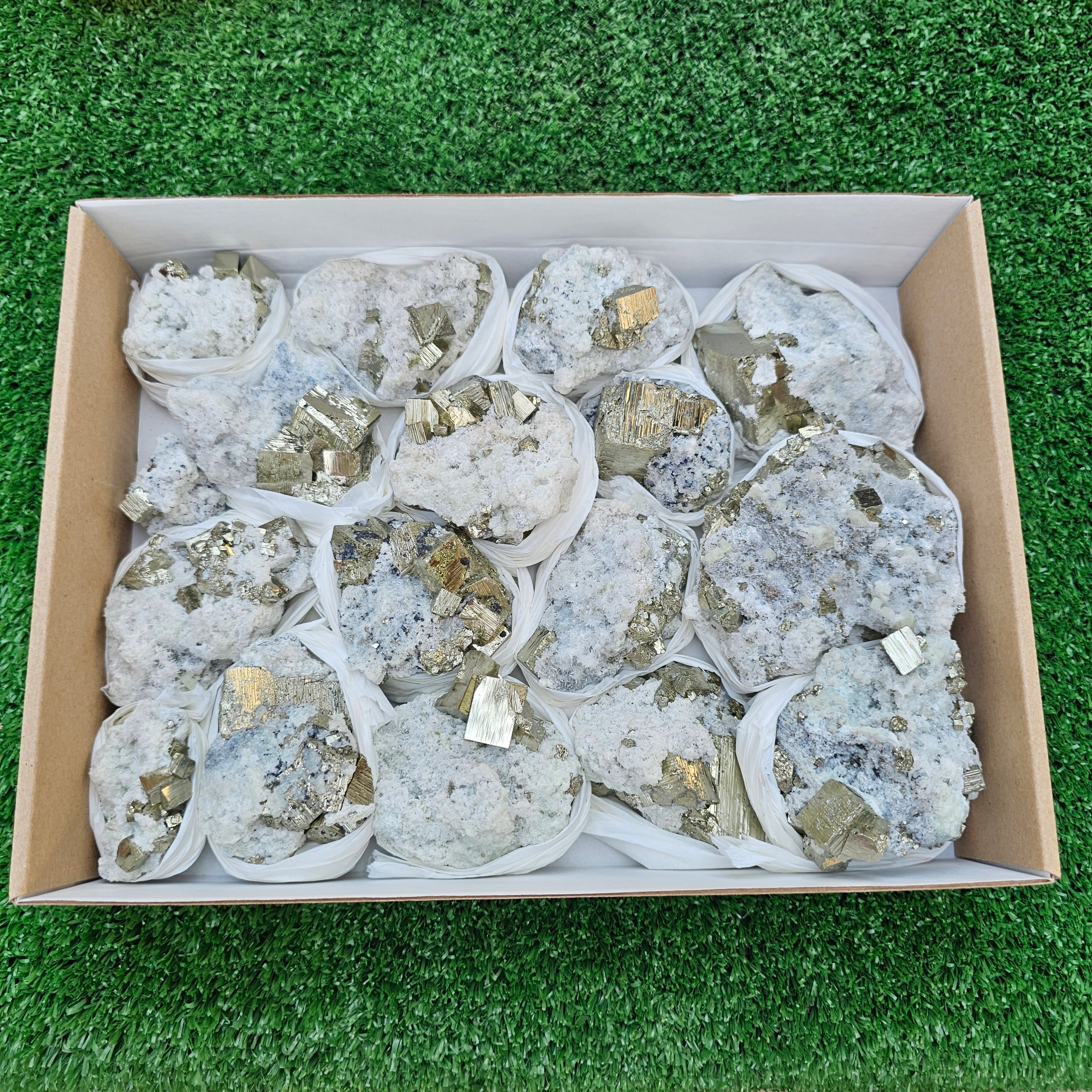 17 pc Pyrite Cubic with calcite flourecent