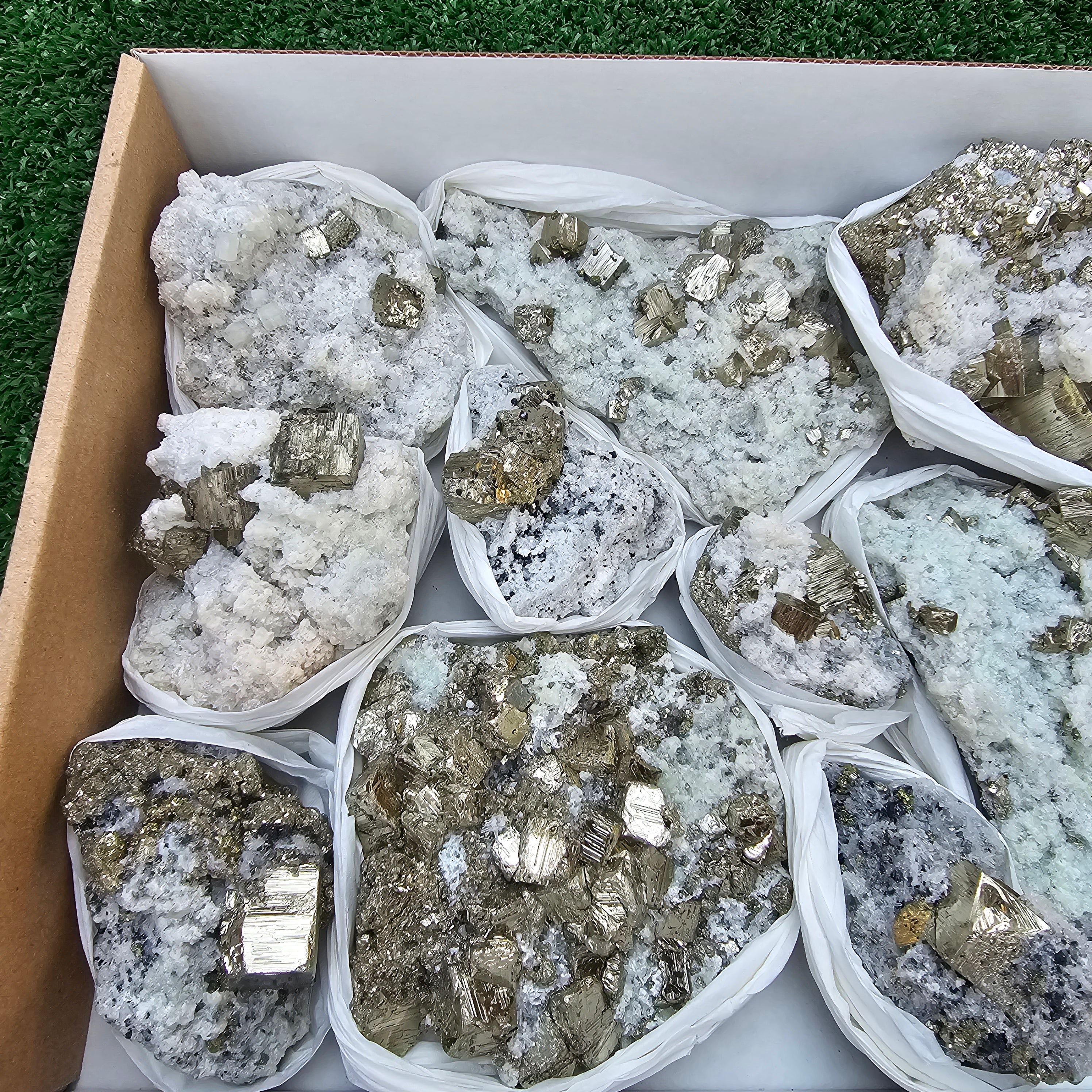 12 pc Pyrite Cubic with calcite flourecent