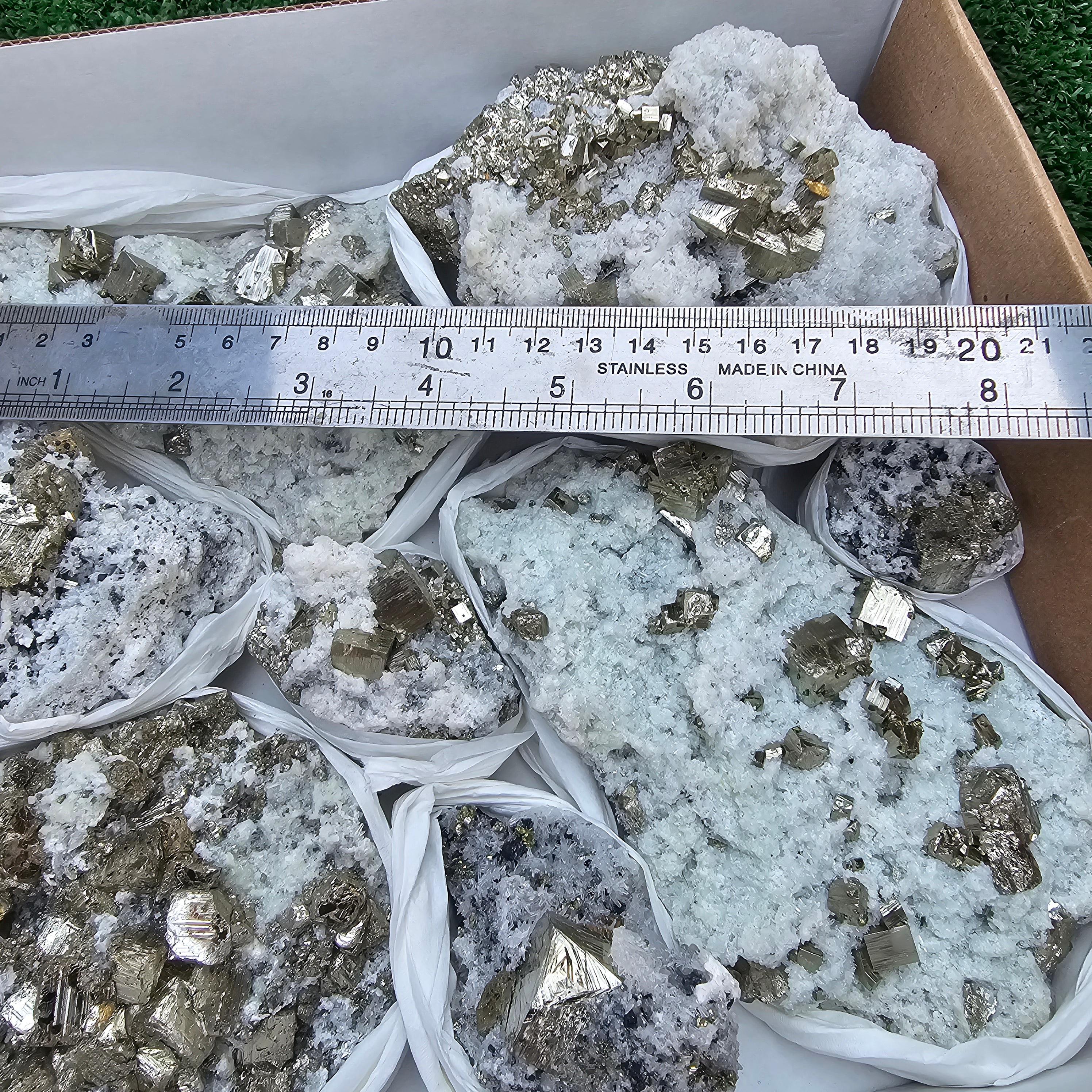 12 pc Pyrite Cubic with calcite flourecent