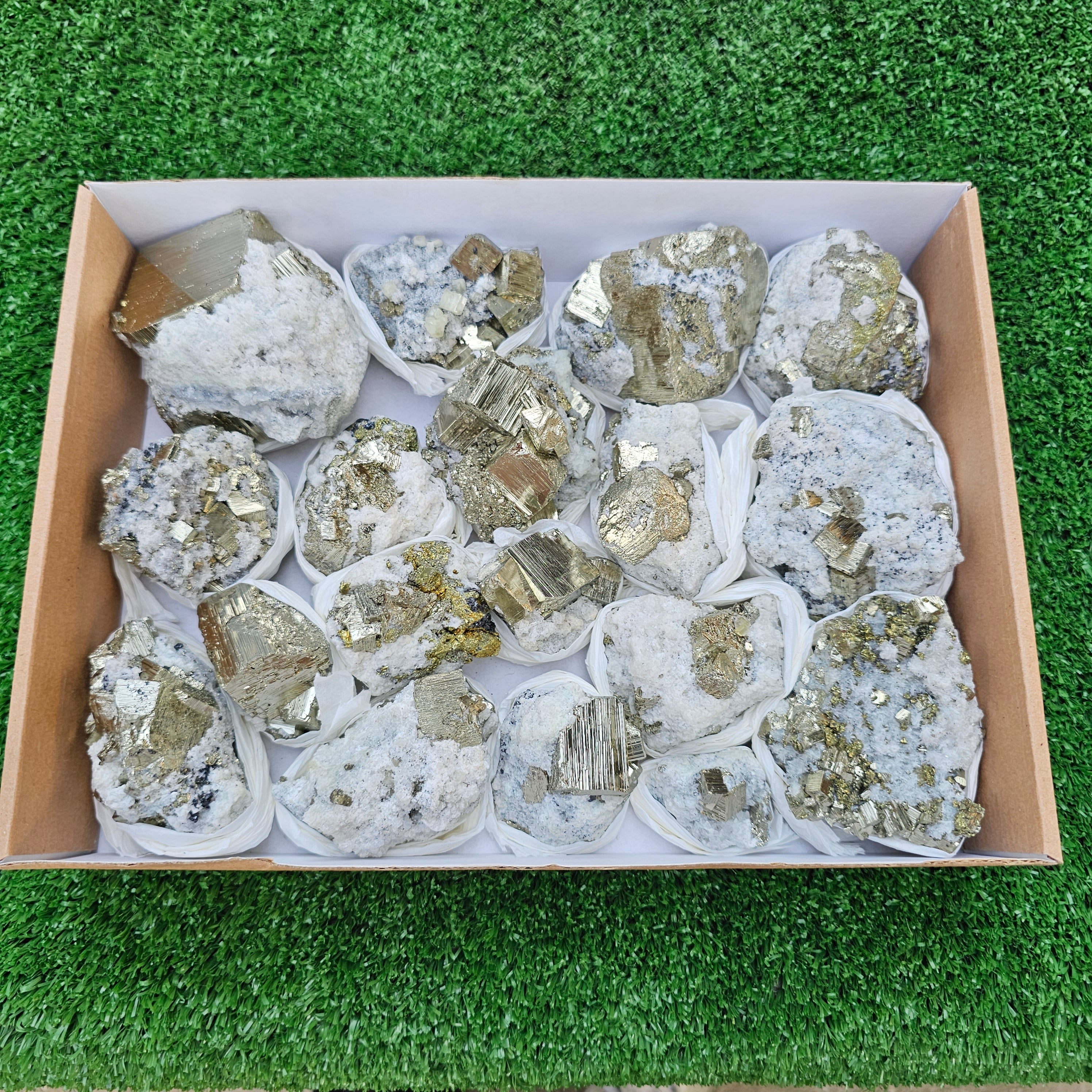 18 pc Pyrite Cubic with calcite flourecent