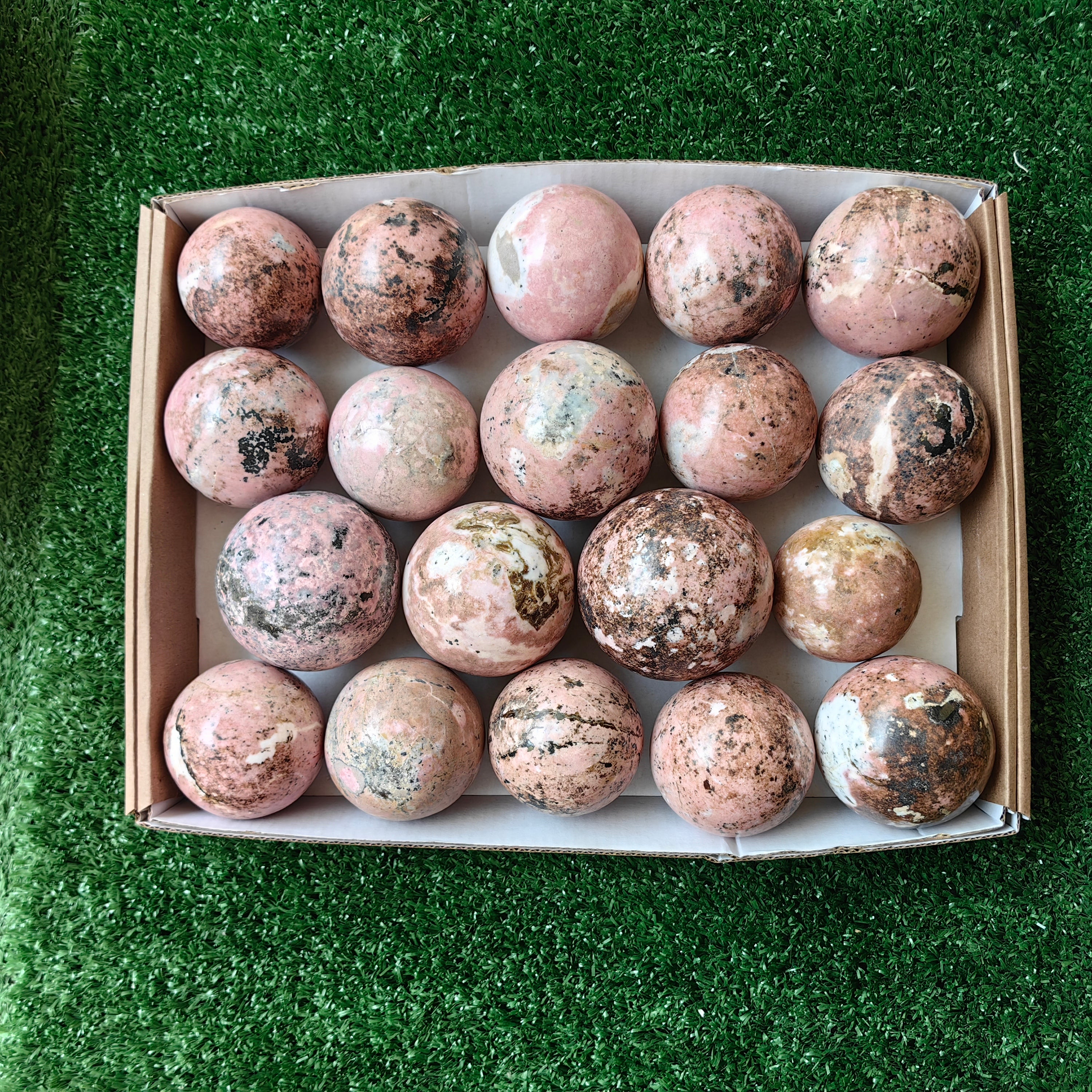 19 pc rhodonite spheres