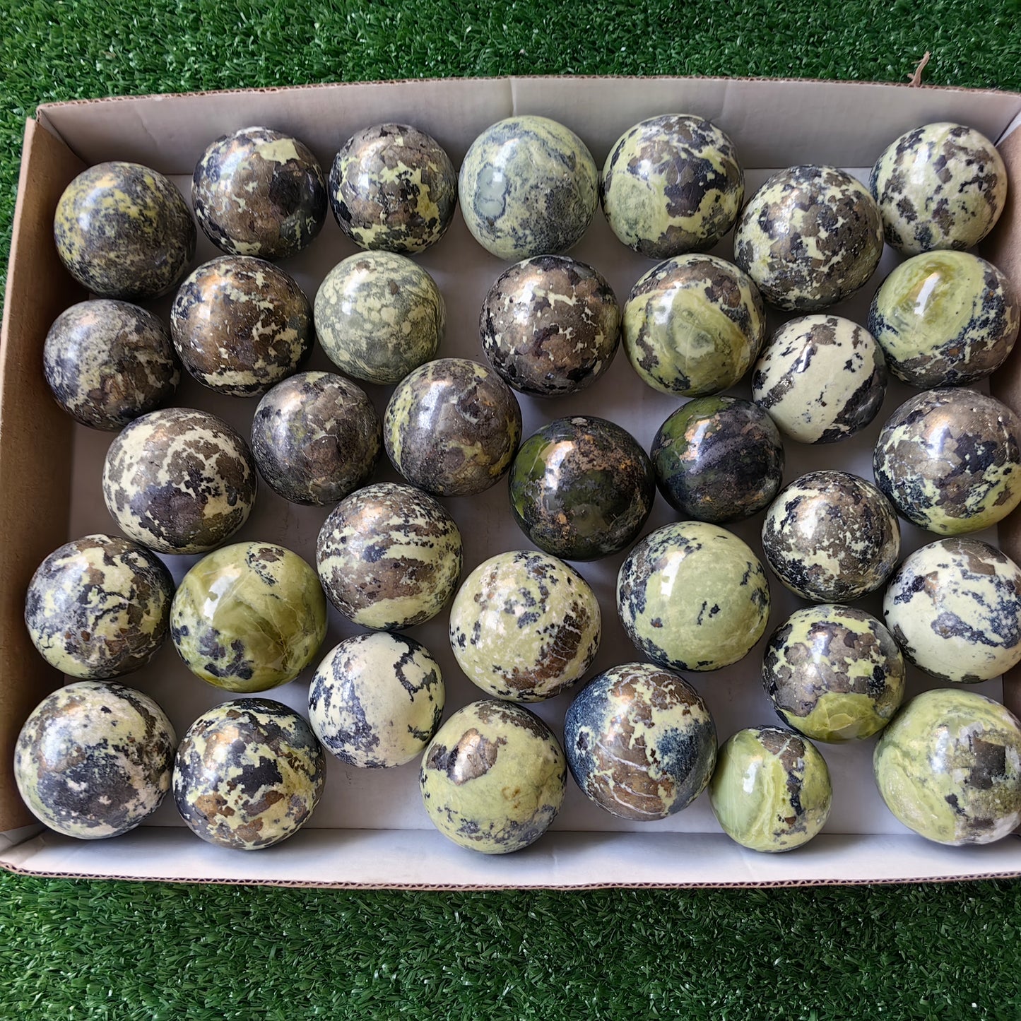 36 pc green serpentine with pyrite spheres