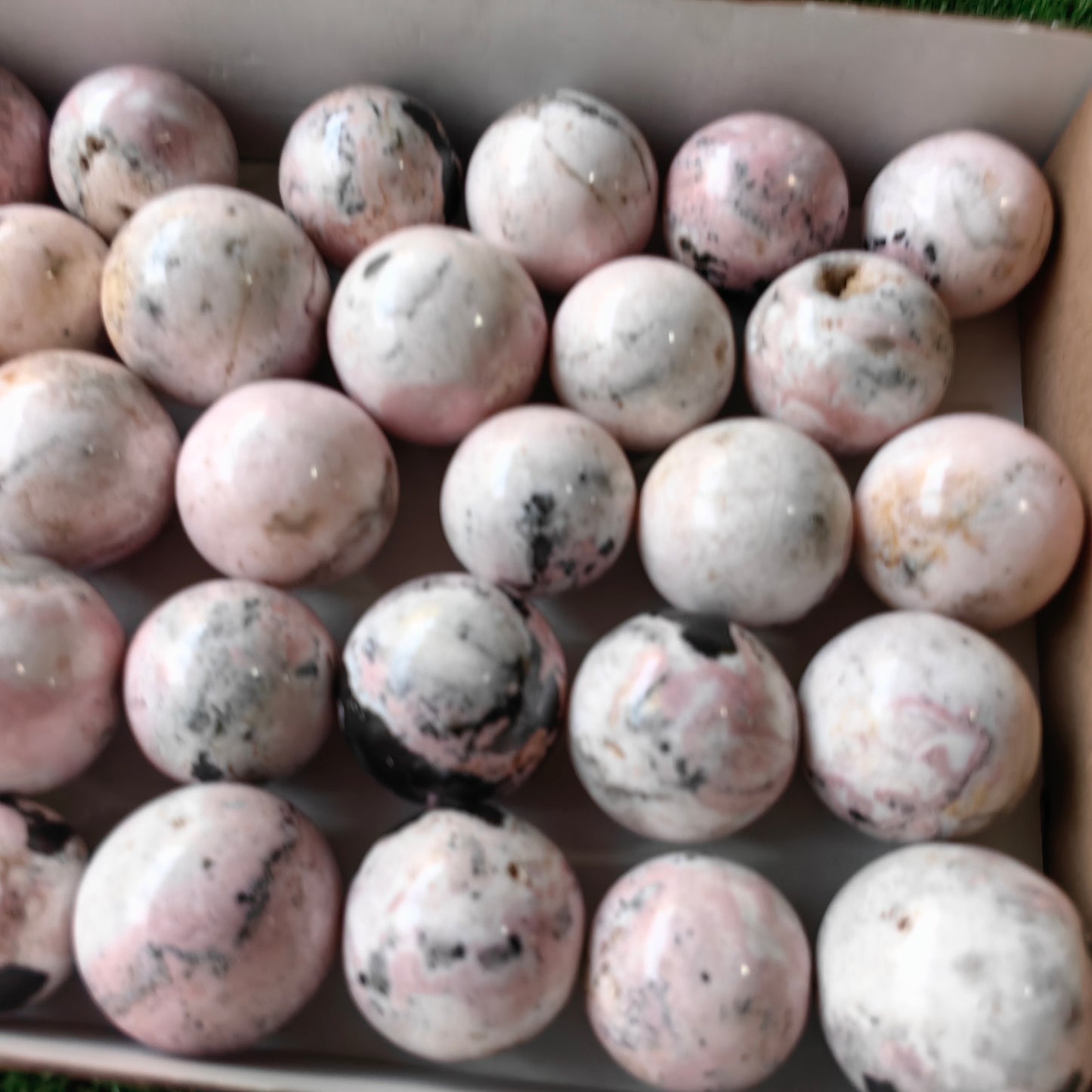 29 pc rhodonite with calcite spheres