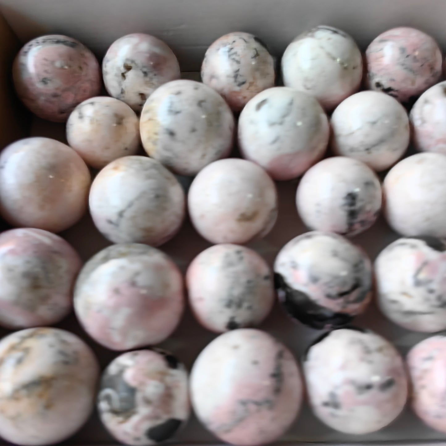 29 pc rhodonite with calcite spheres