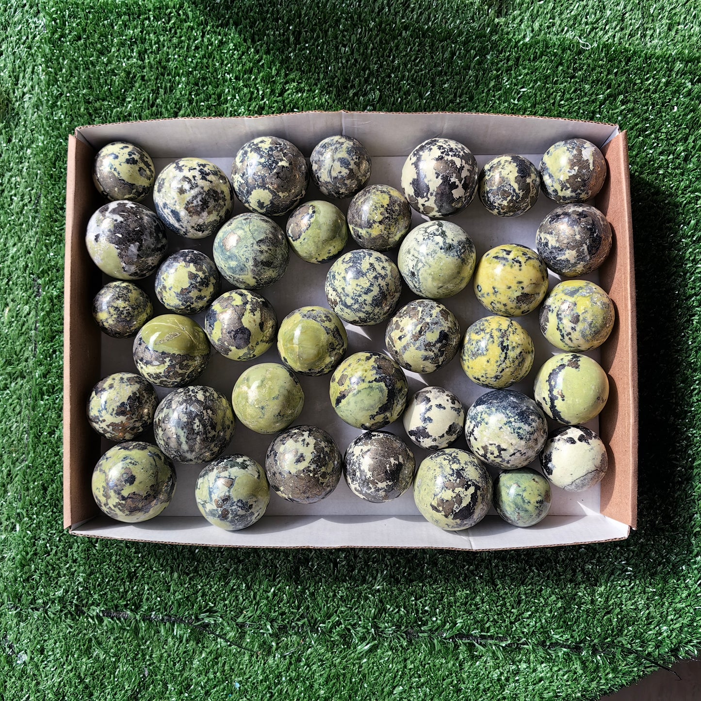 37 pc green serpentine with pyrite spheres