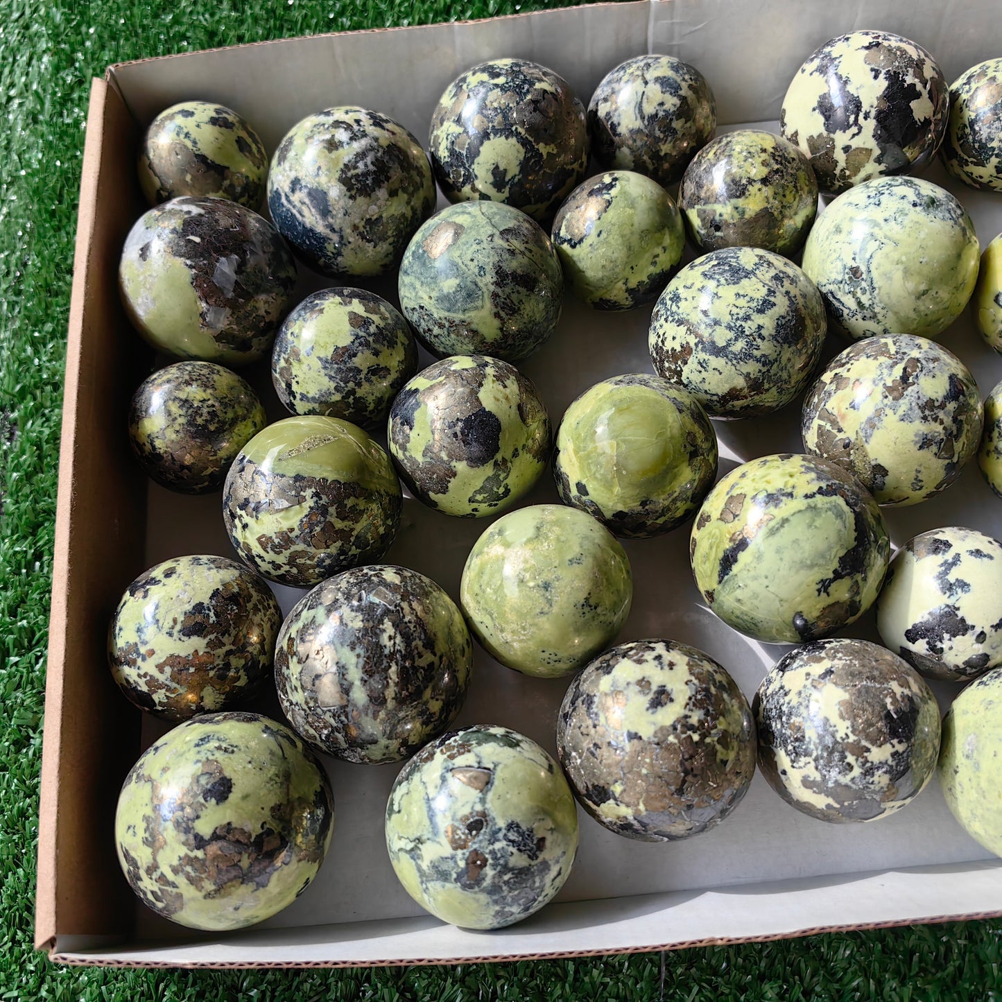 37 pc green serpentine with pyrite spheres