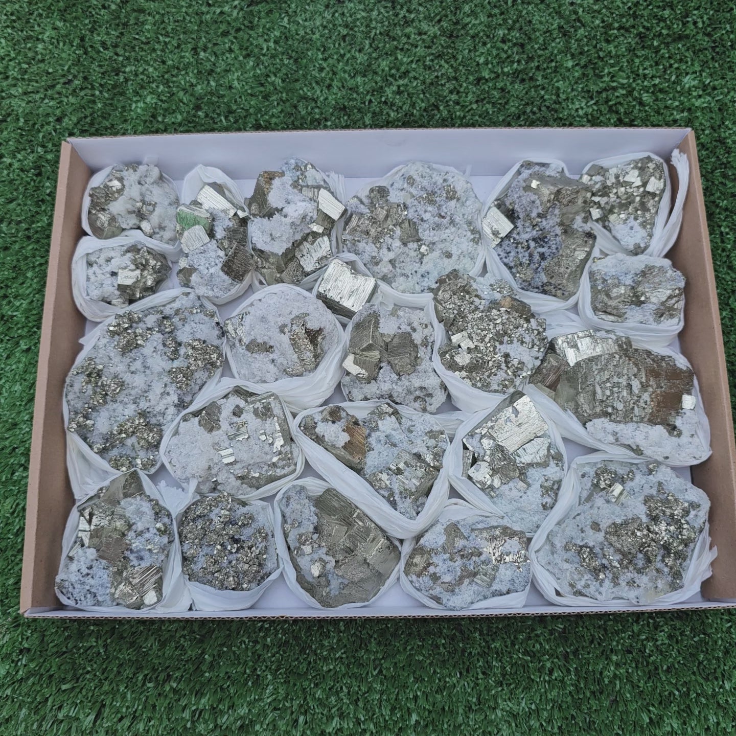 Load video: 22 pc Box Pyrite Cubic with calcite flourecent