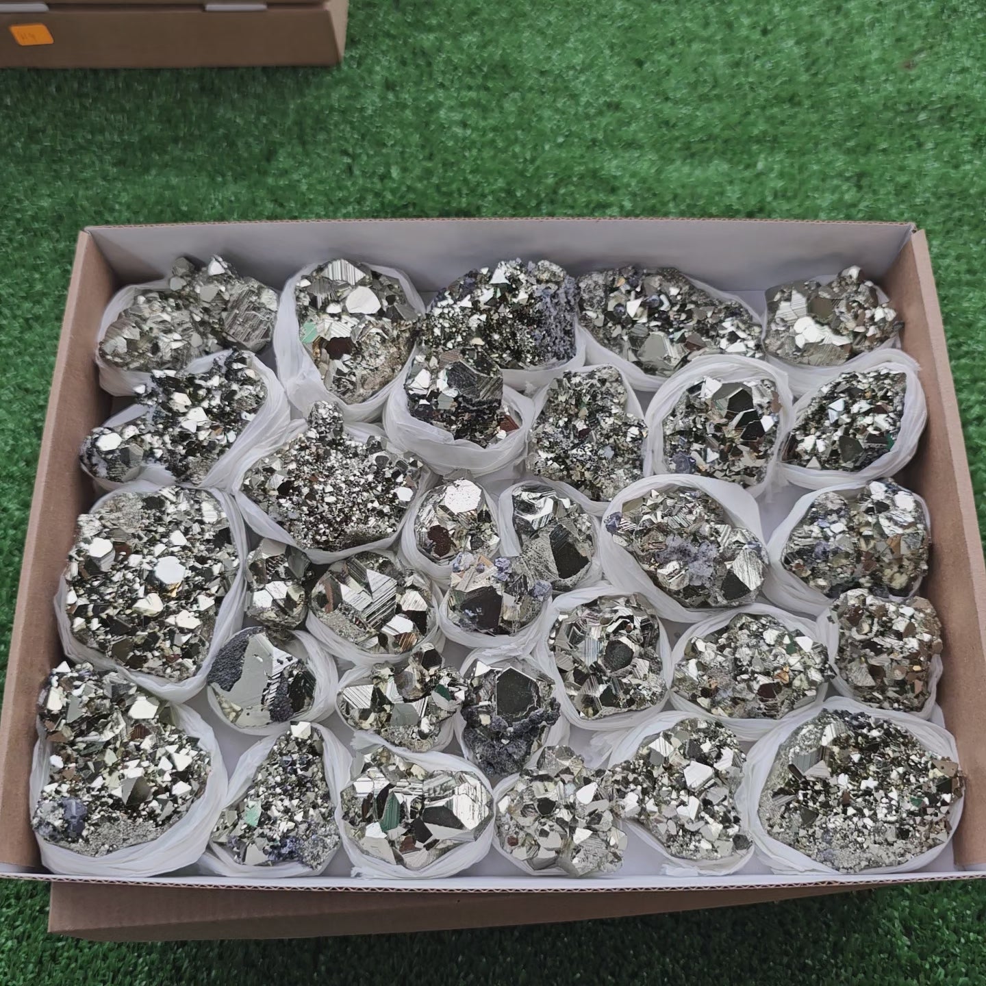 Load video: Box 31 pcs big pyrite Octahedral