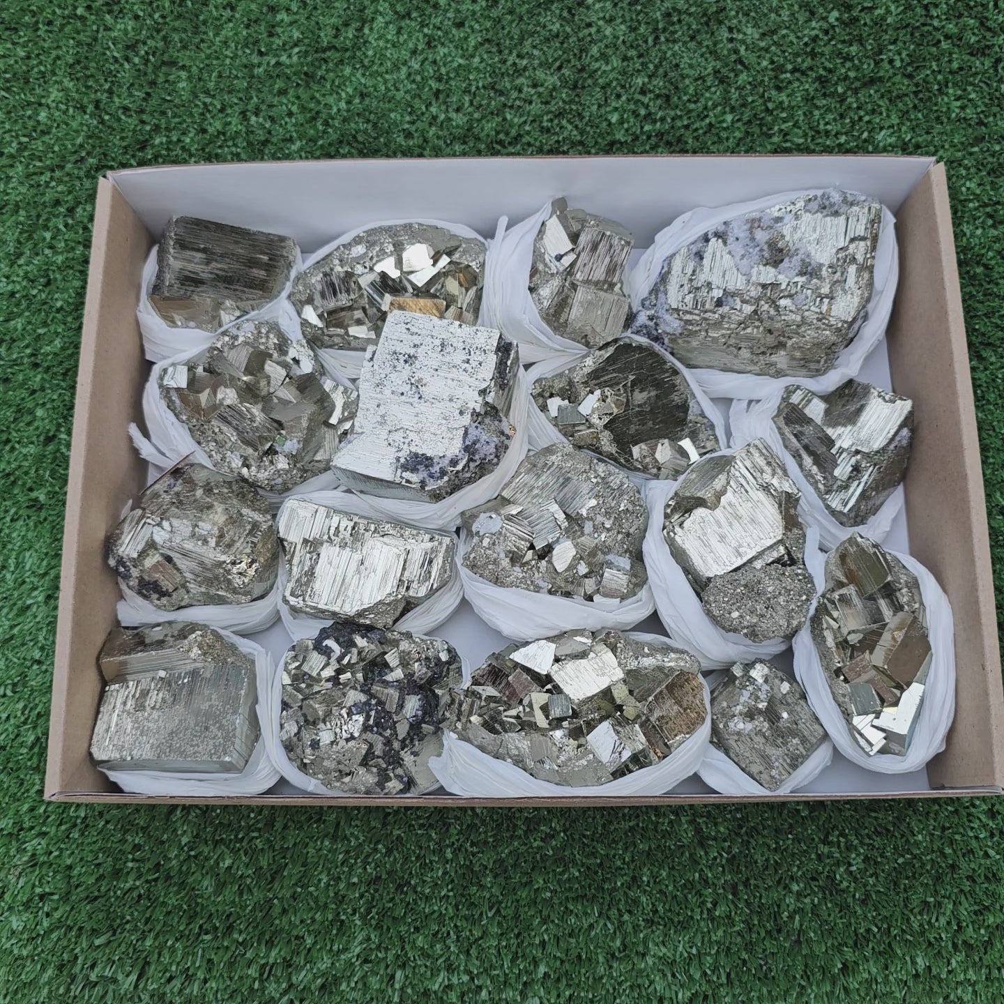 Load video: 17 pc Pyrite Cubic with calcite flourecent