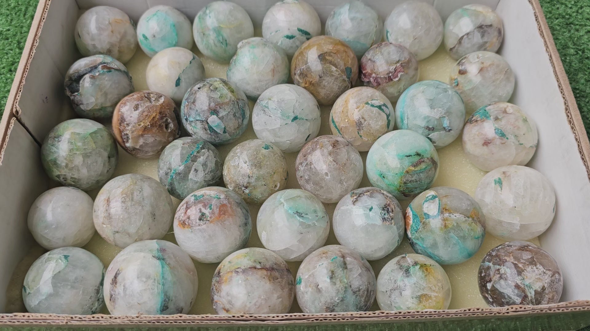 Load video: Lot 37 Spheres Quartz with Chrysocolla