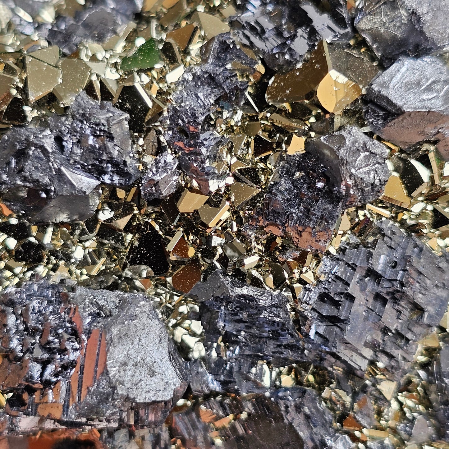 Galena Crystals on Octahedral Pyrite