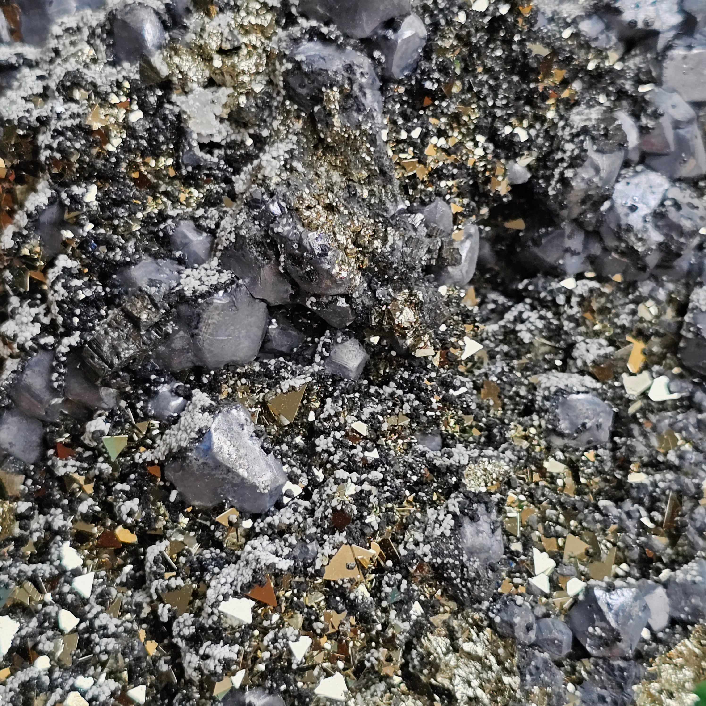 Galena Crystals on Octahedral Pyrite