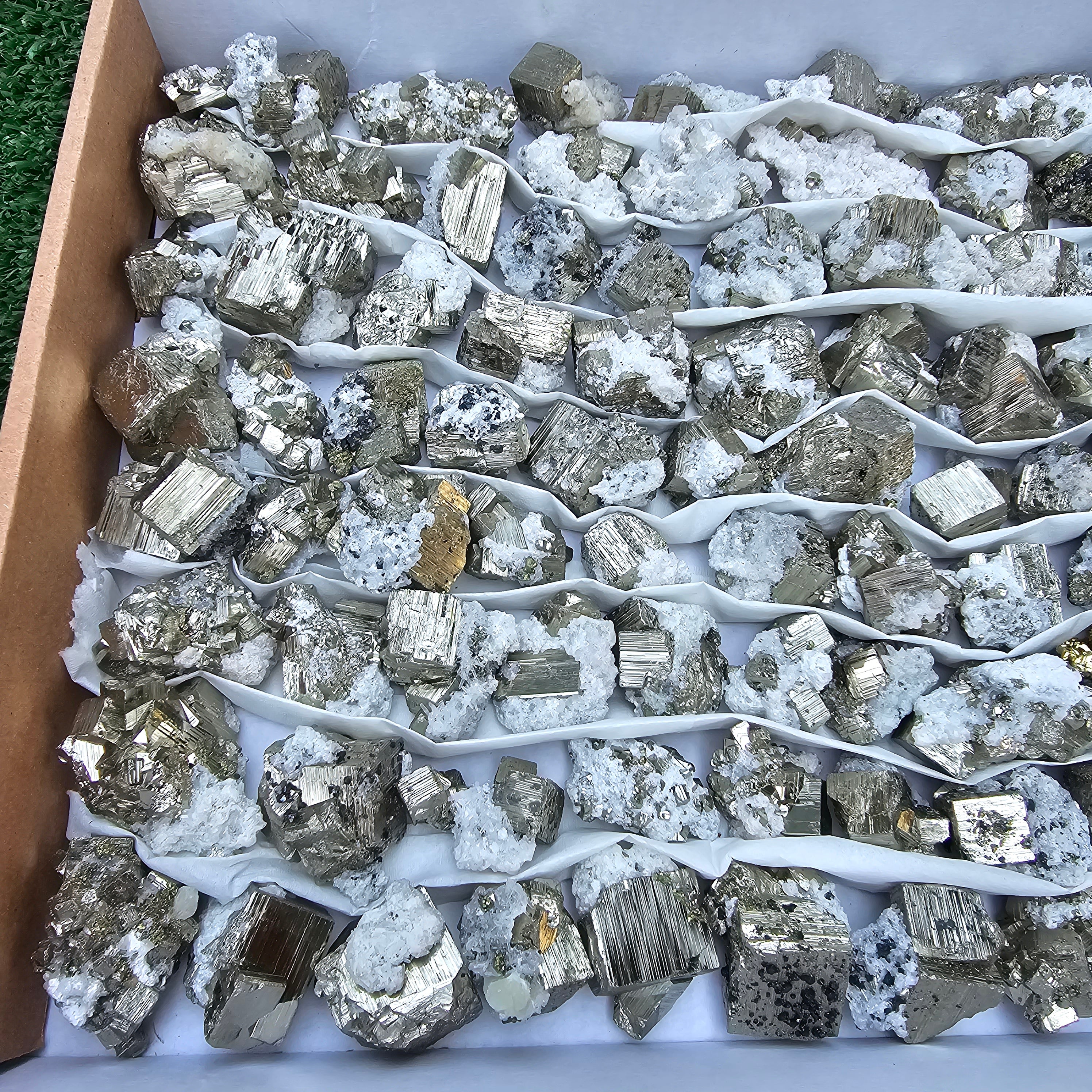 84 pc Box Pyrite Cubic with calcite flourecent