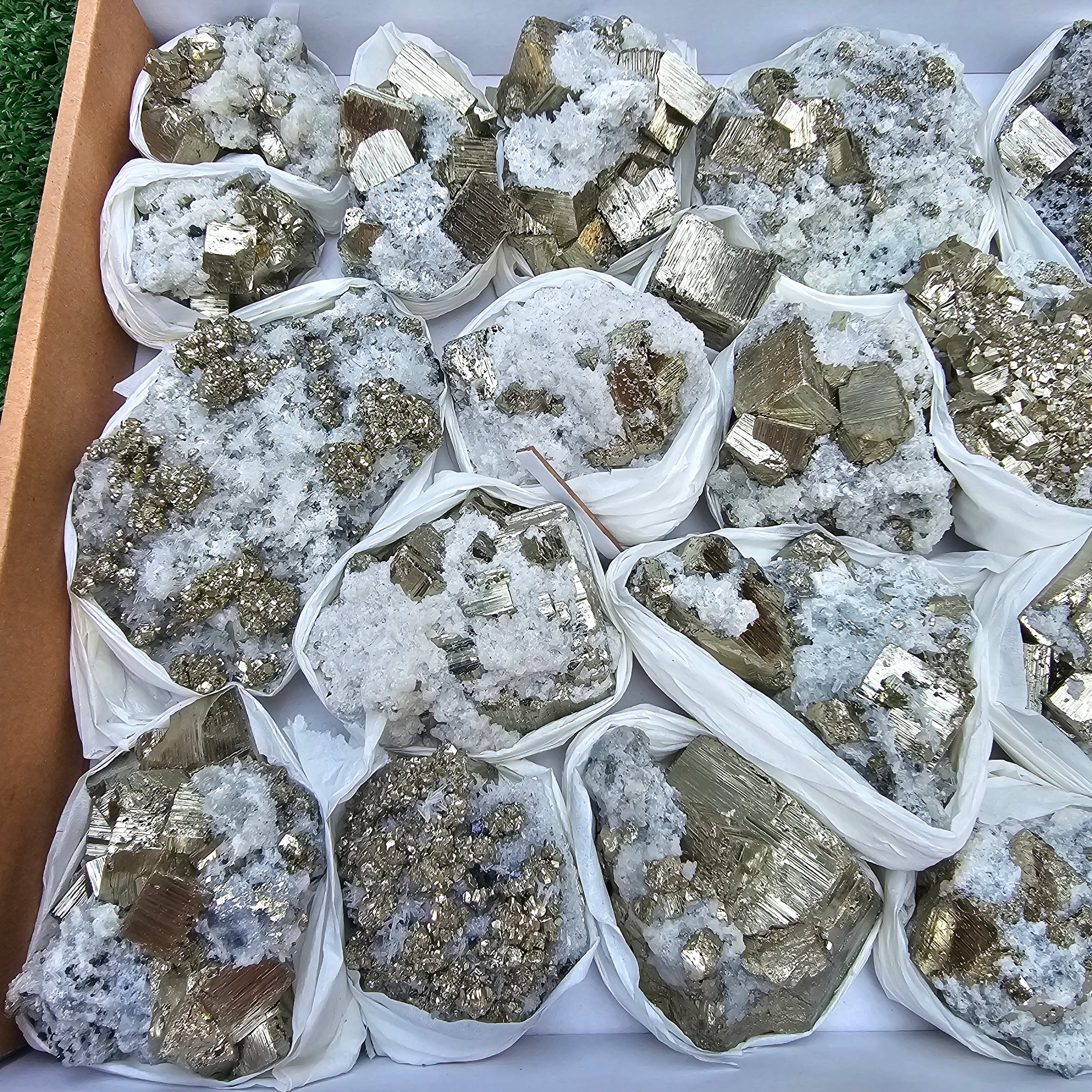 22 pc Box Pyrite Cubic with calcite flourecent