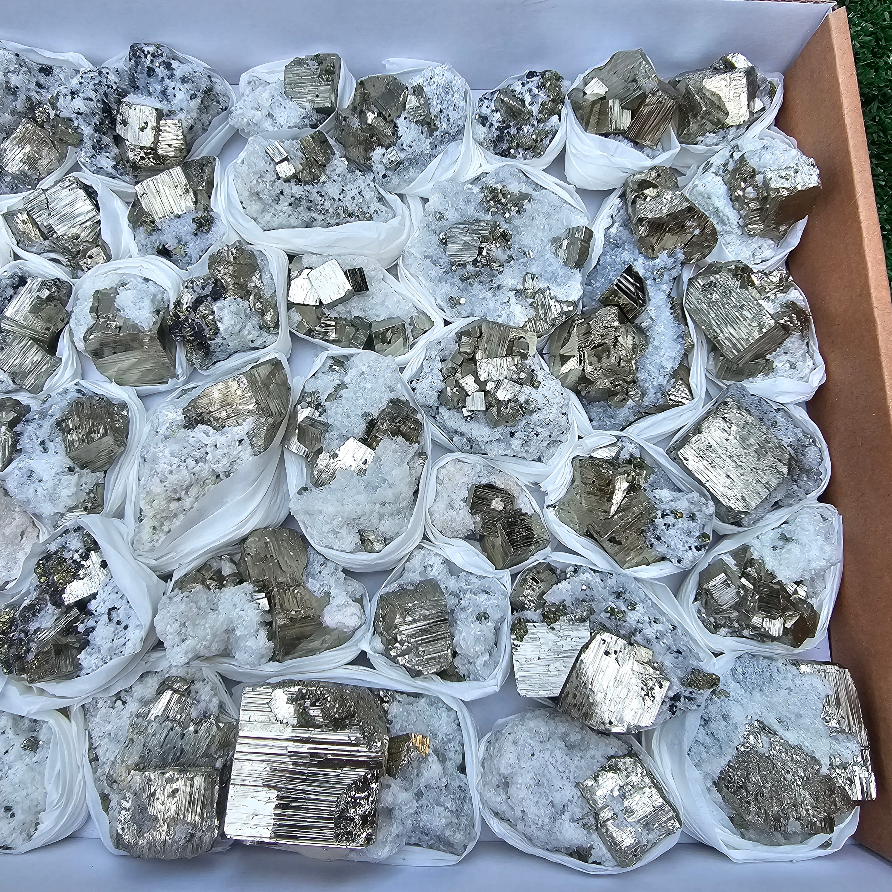 48 pc Pyrite Cubic with calcite flourecent