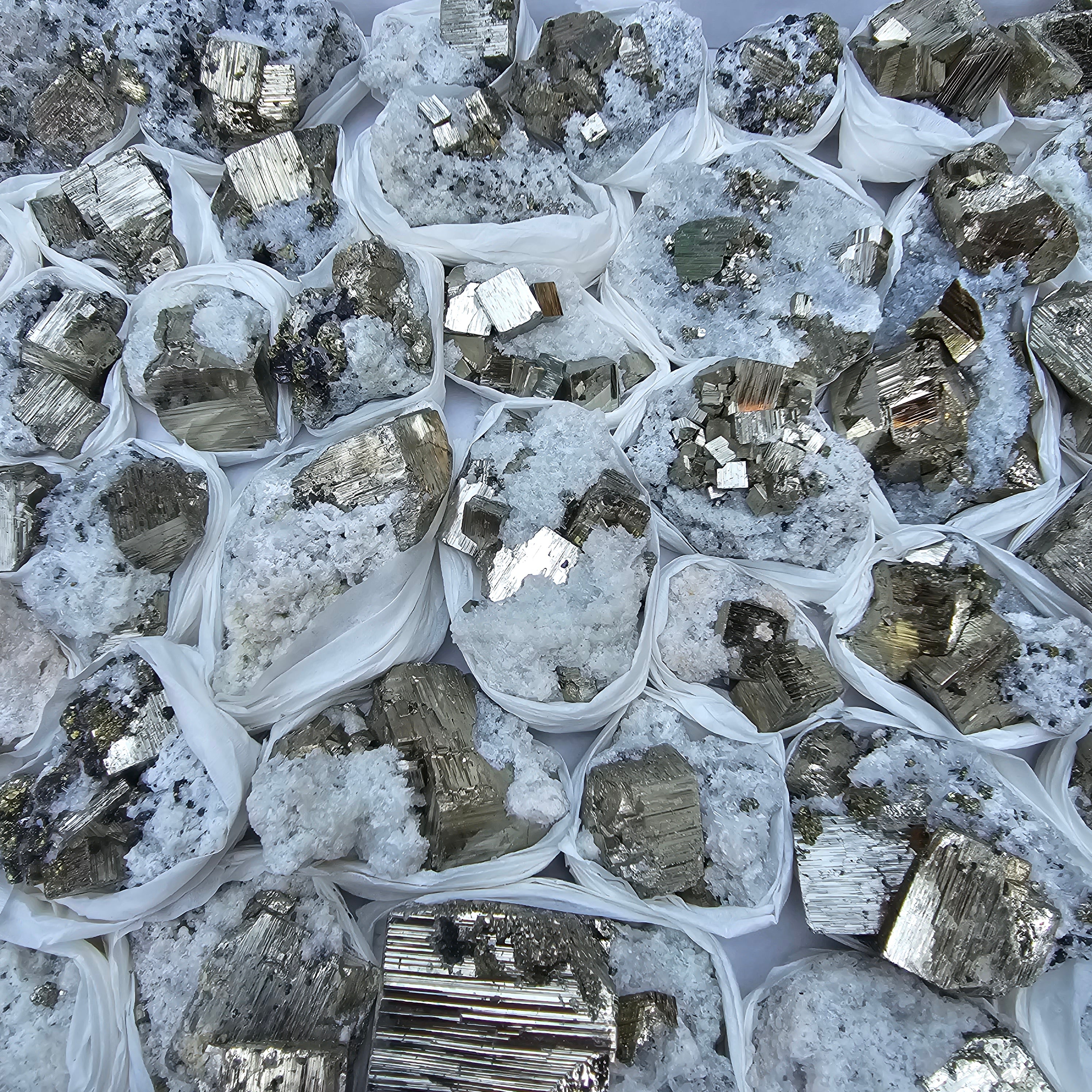 48 pc Pyrite Cubic with calcite flourecent
