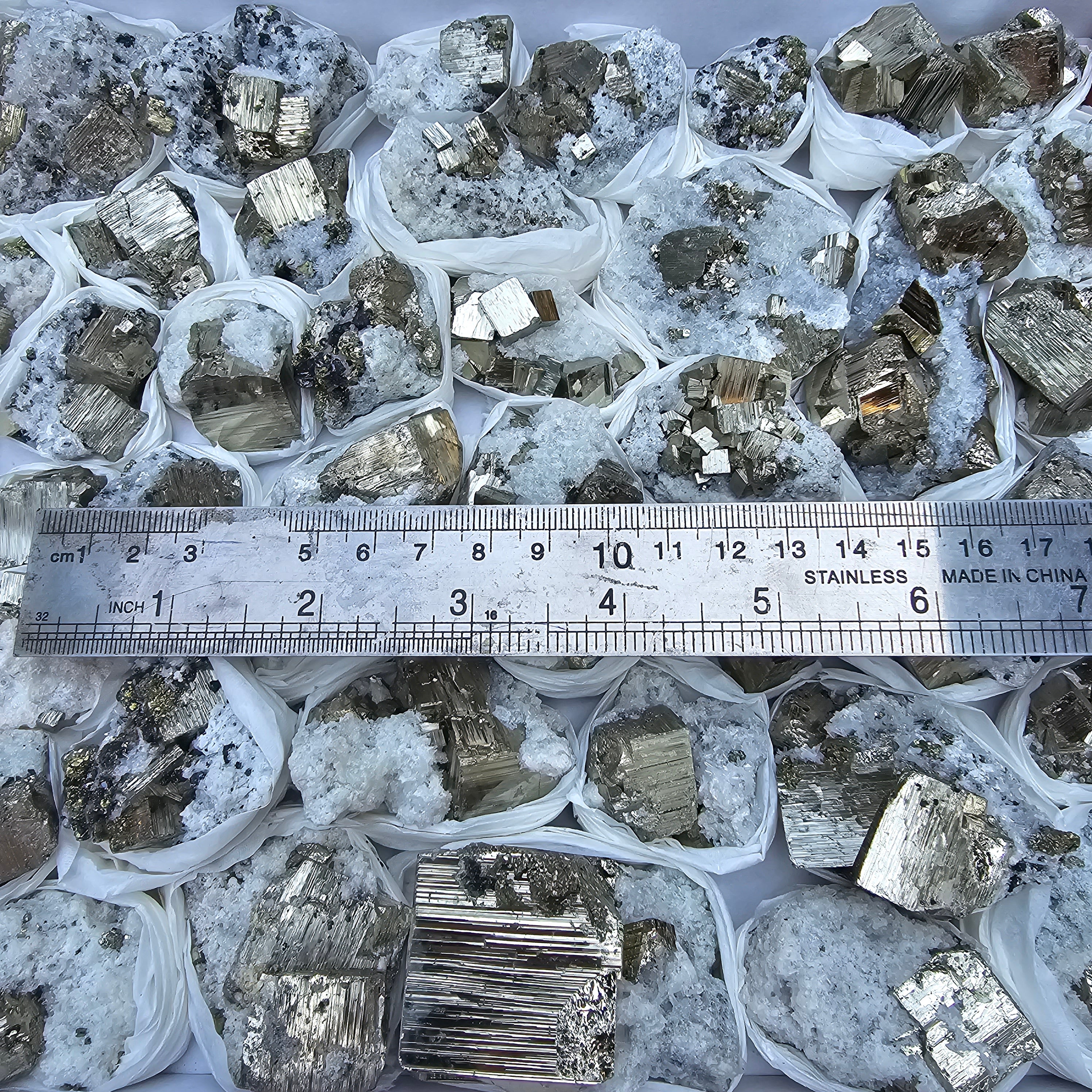 48 pc Pyrite Cubic with calcite flourecent