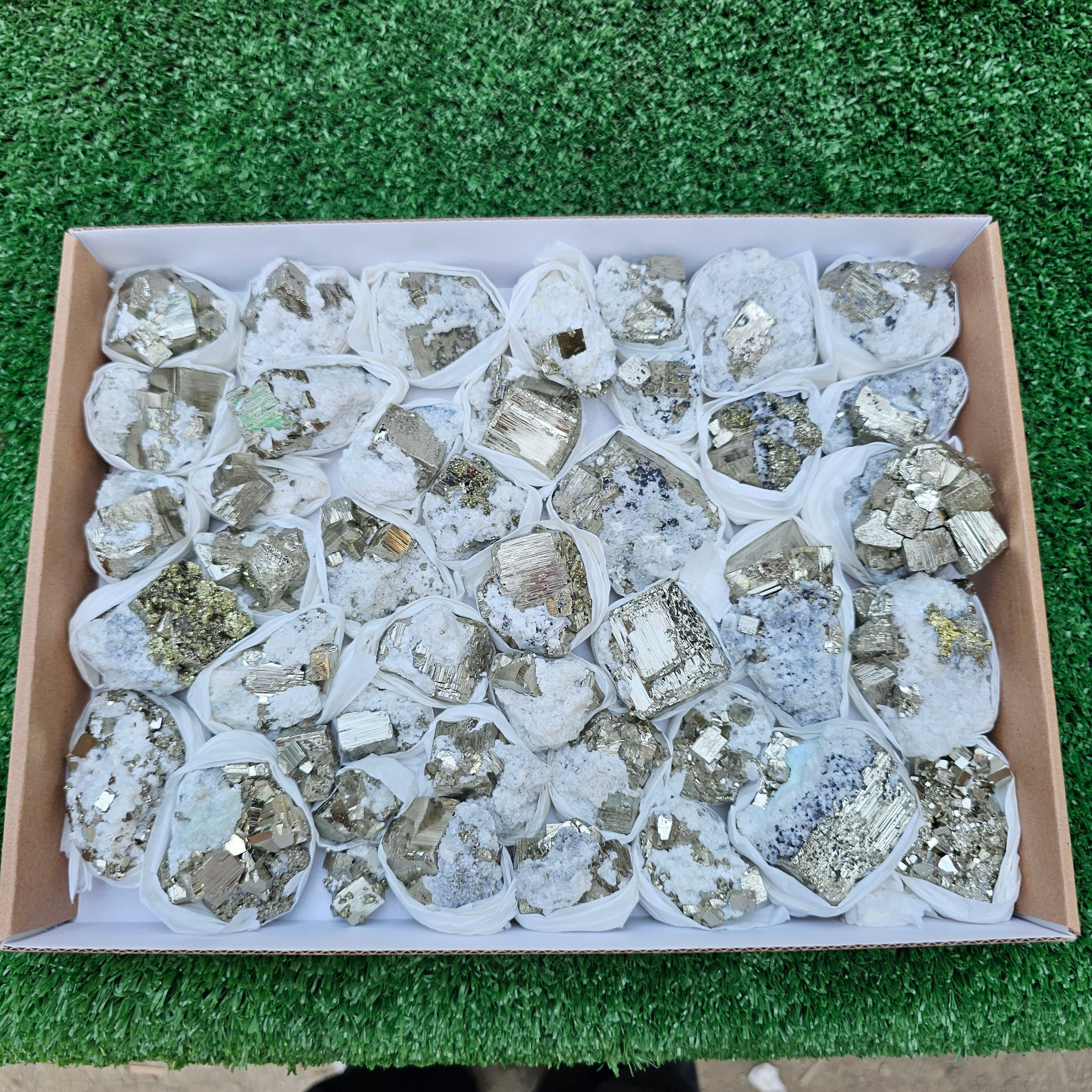 42 pc Pyrite Cubic with calcite flourecent