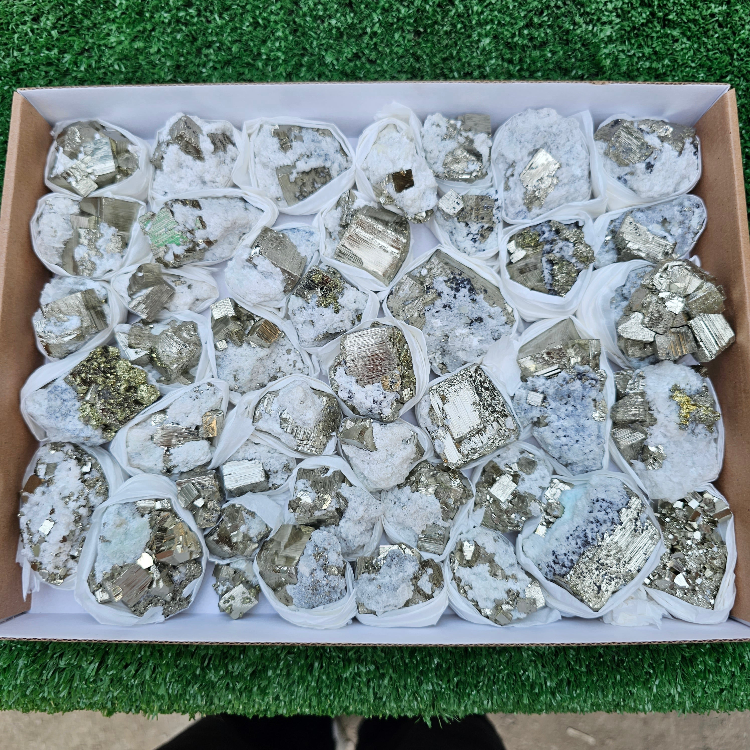 42 pc Pyrite Cubic with calcite flourecent