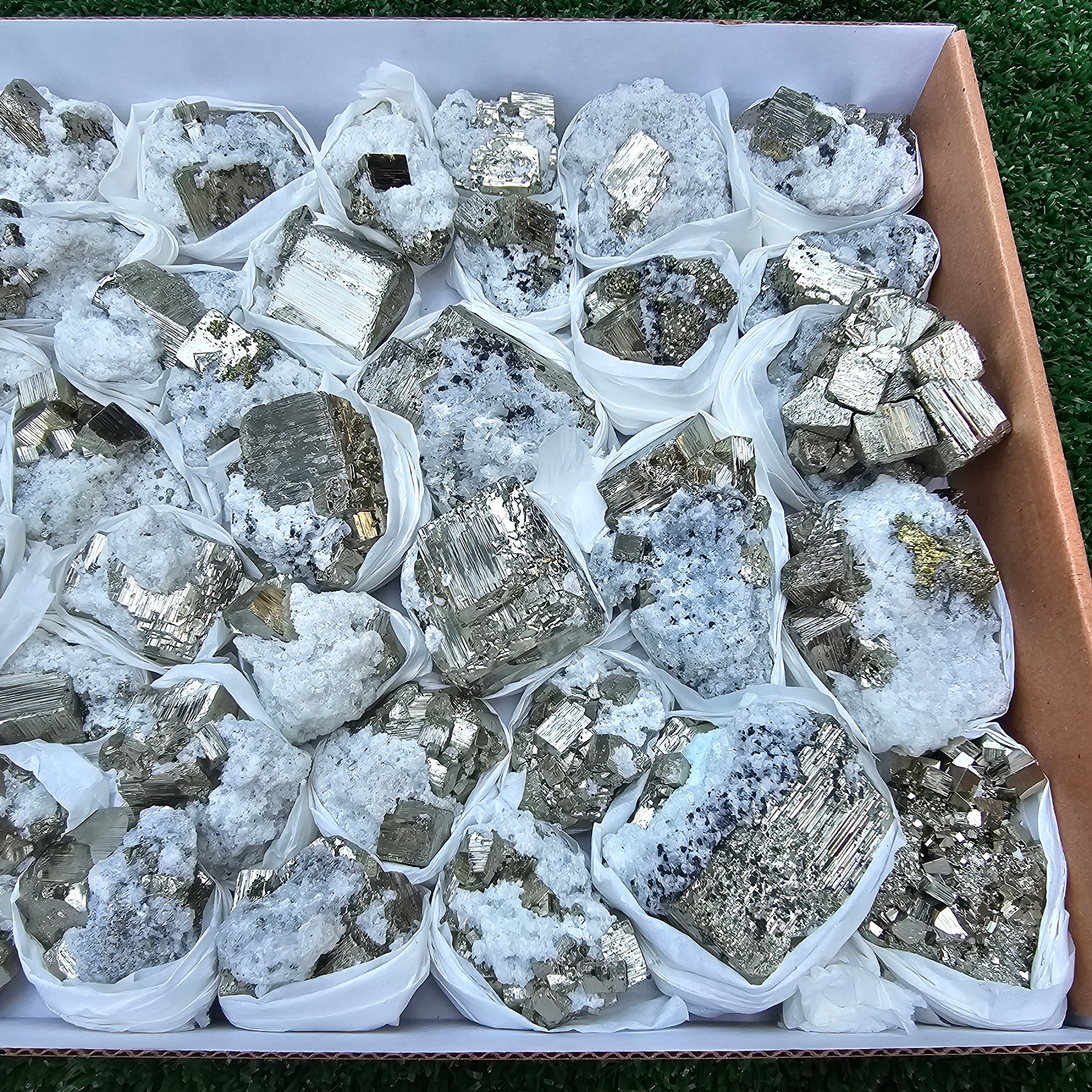42 pc Pyrite Cubic with calcite flourecent