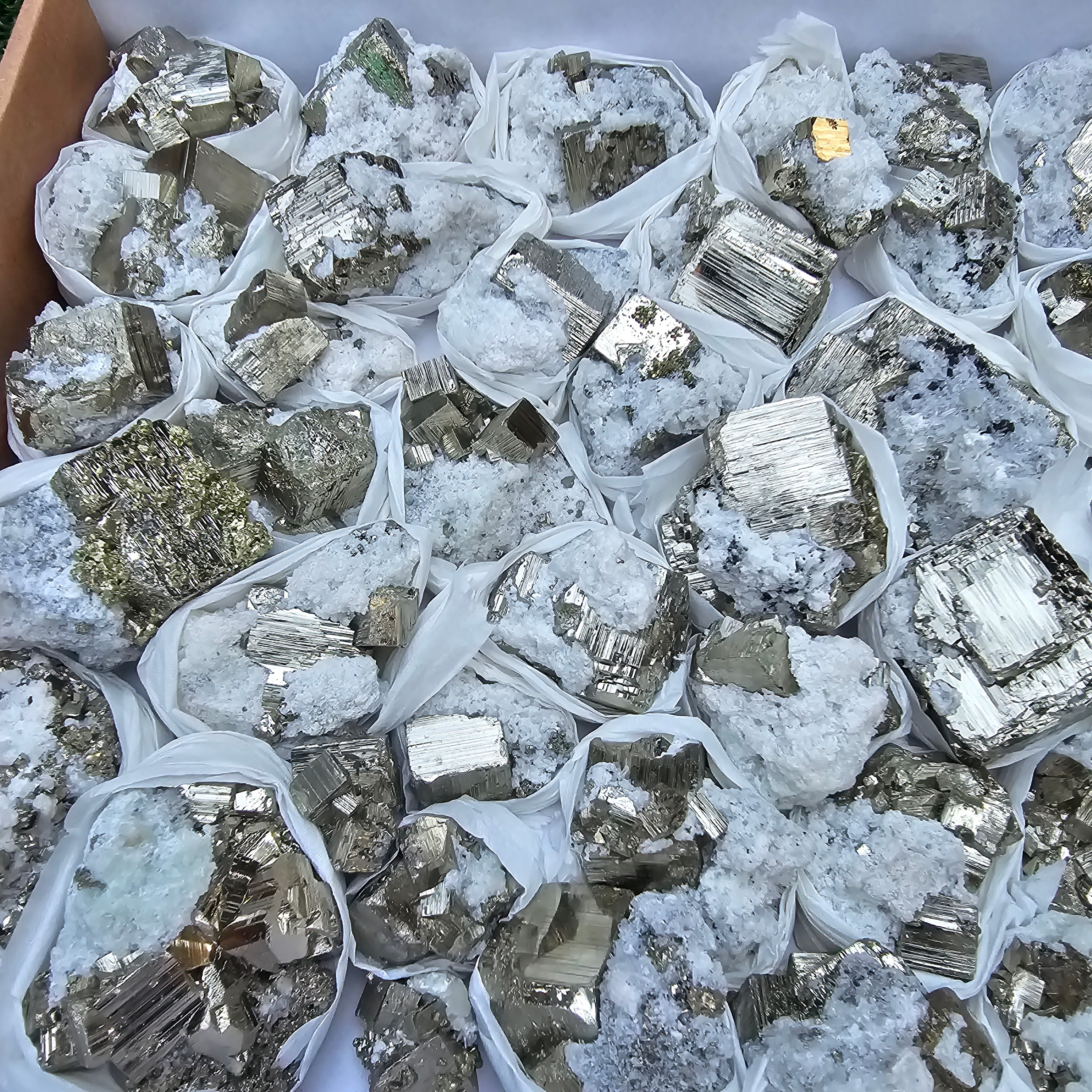 42 pc Pyrite Cubic with calcite flourecent