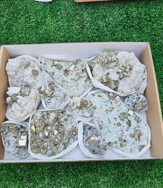 12 pc Pyrite Cubic with calcite flourecent