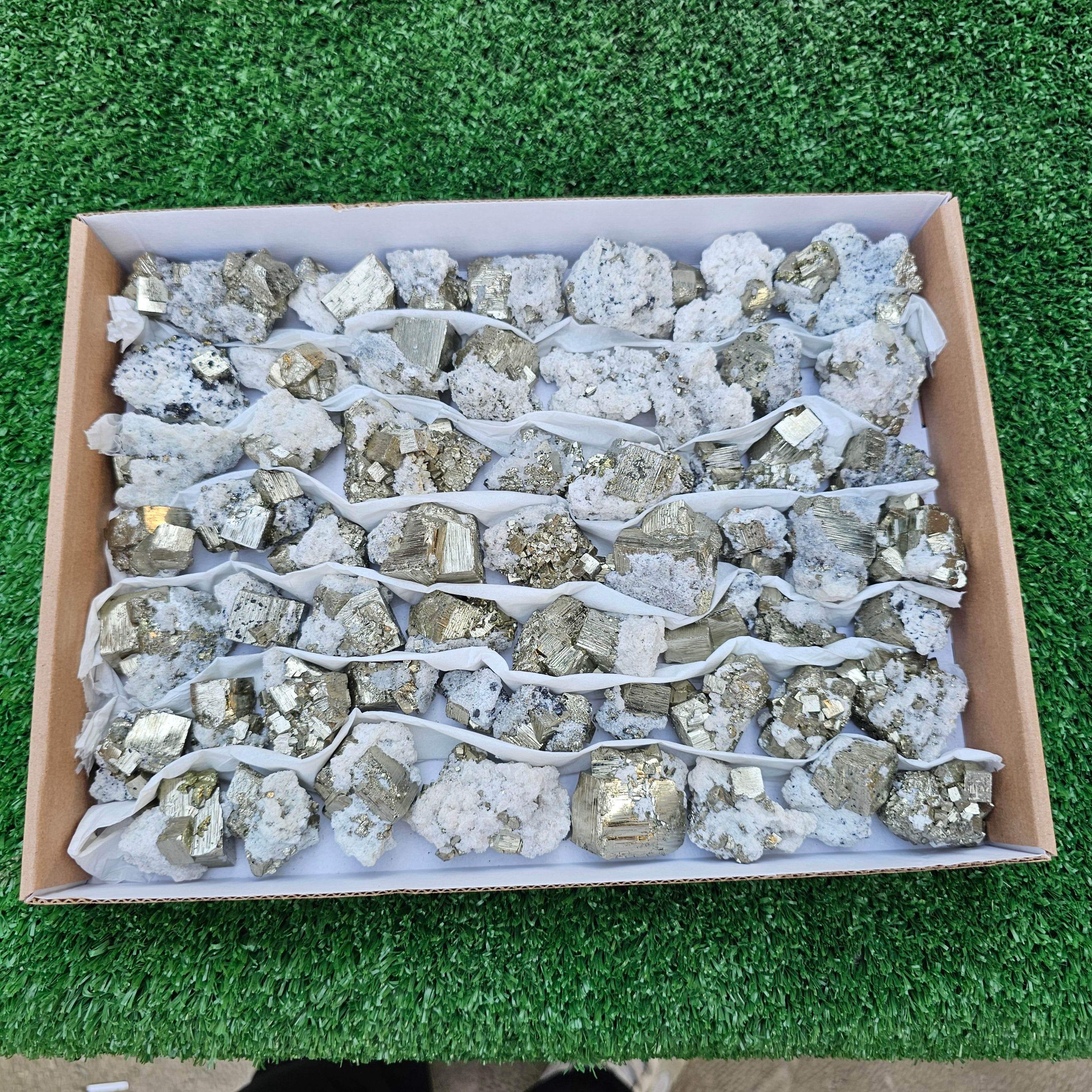 58 pc Pyrite Cubic with calcite flourecent