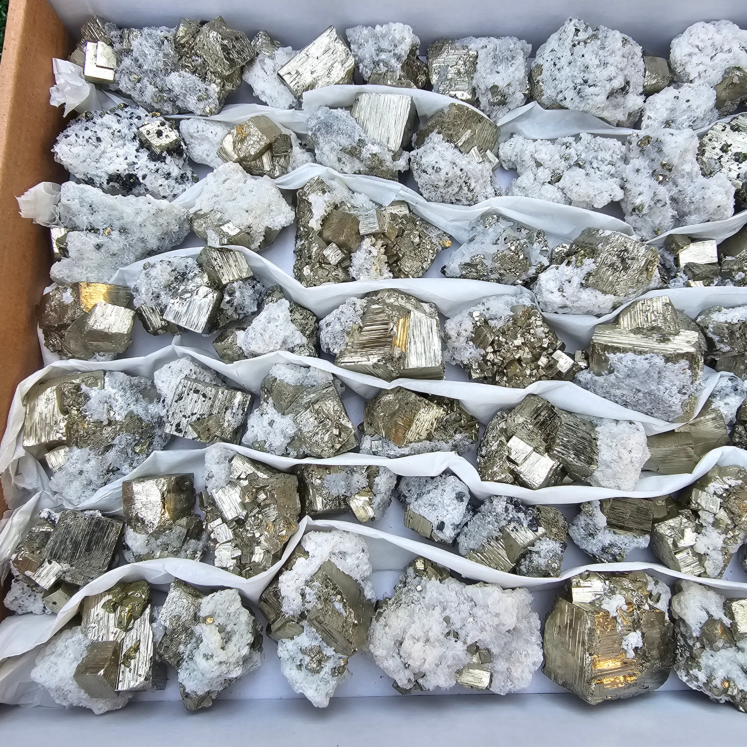 58 pc Pyrite Cubic with calcite flourecent