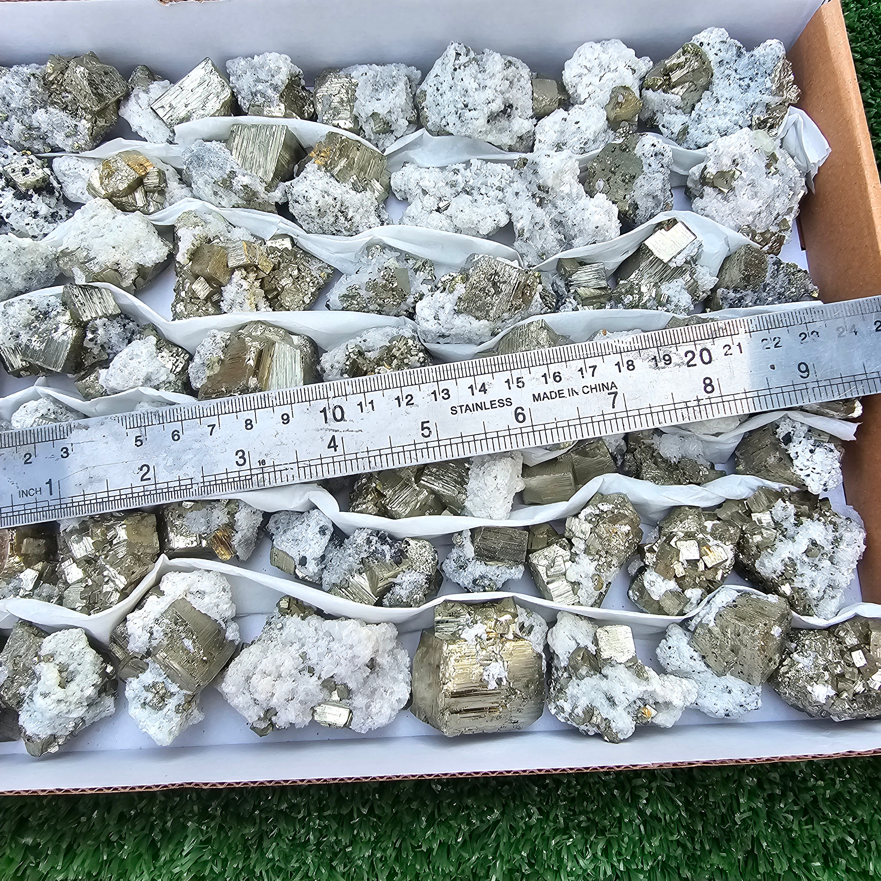 58 pc Pyrite Cubic with calcite flourecent