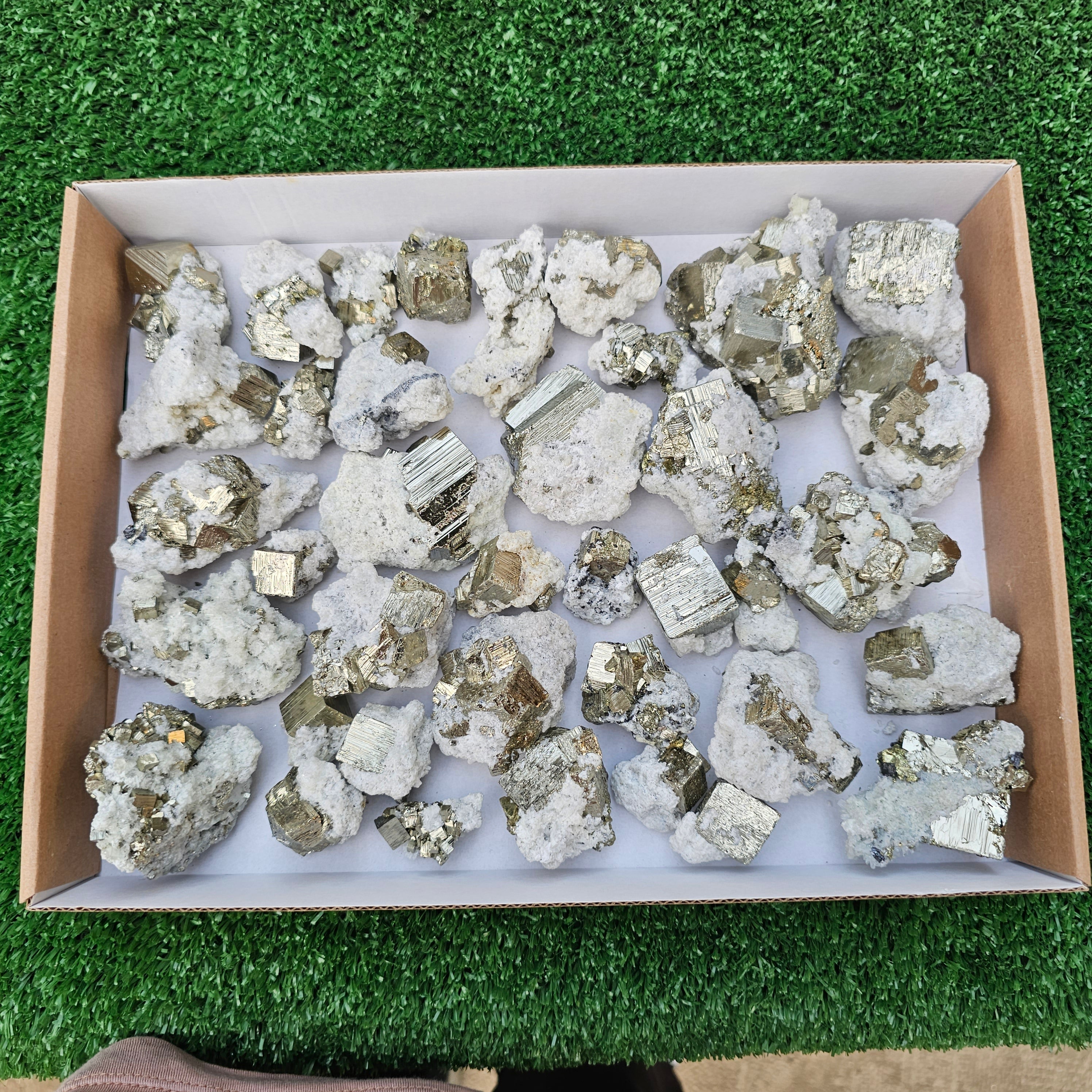 40 pc Pyrite Cubic with calcite flourecent