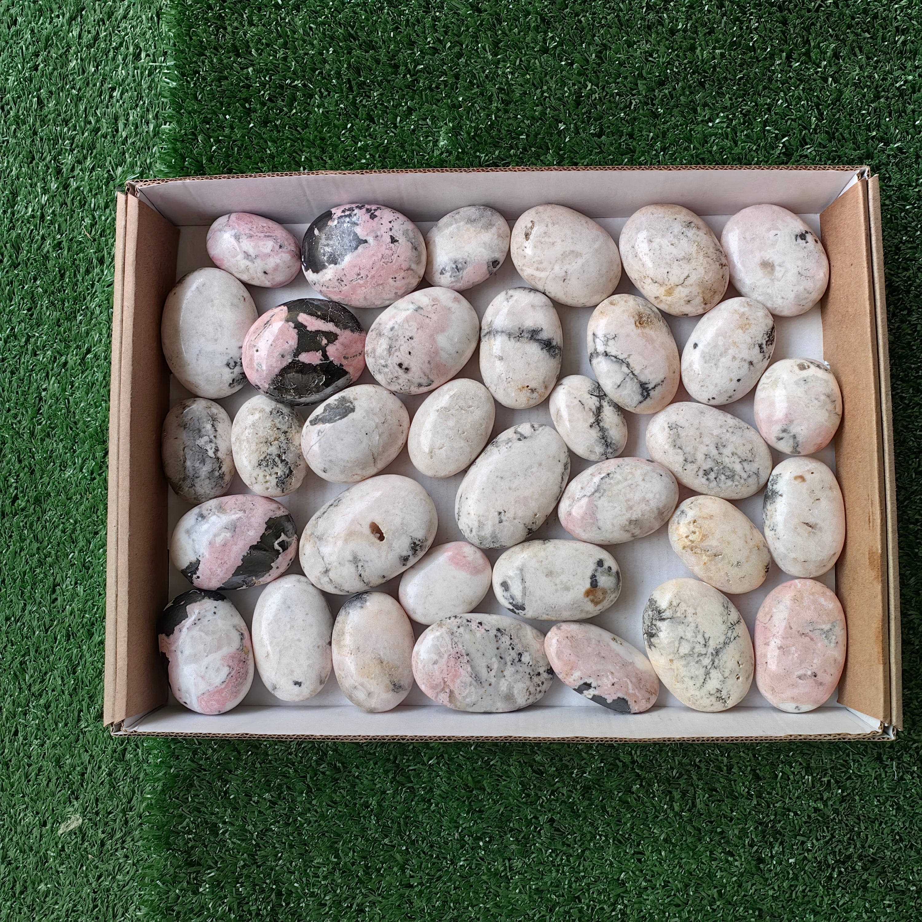 34 pc mangano calcite with rhodonite palms