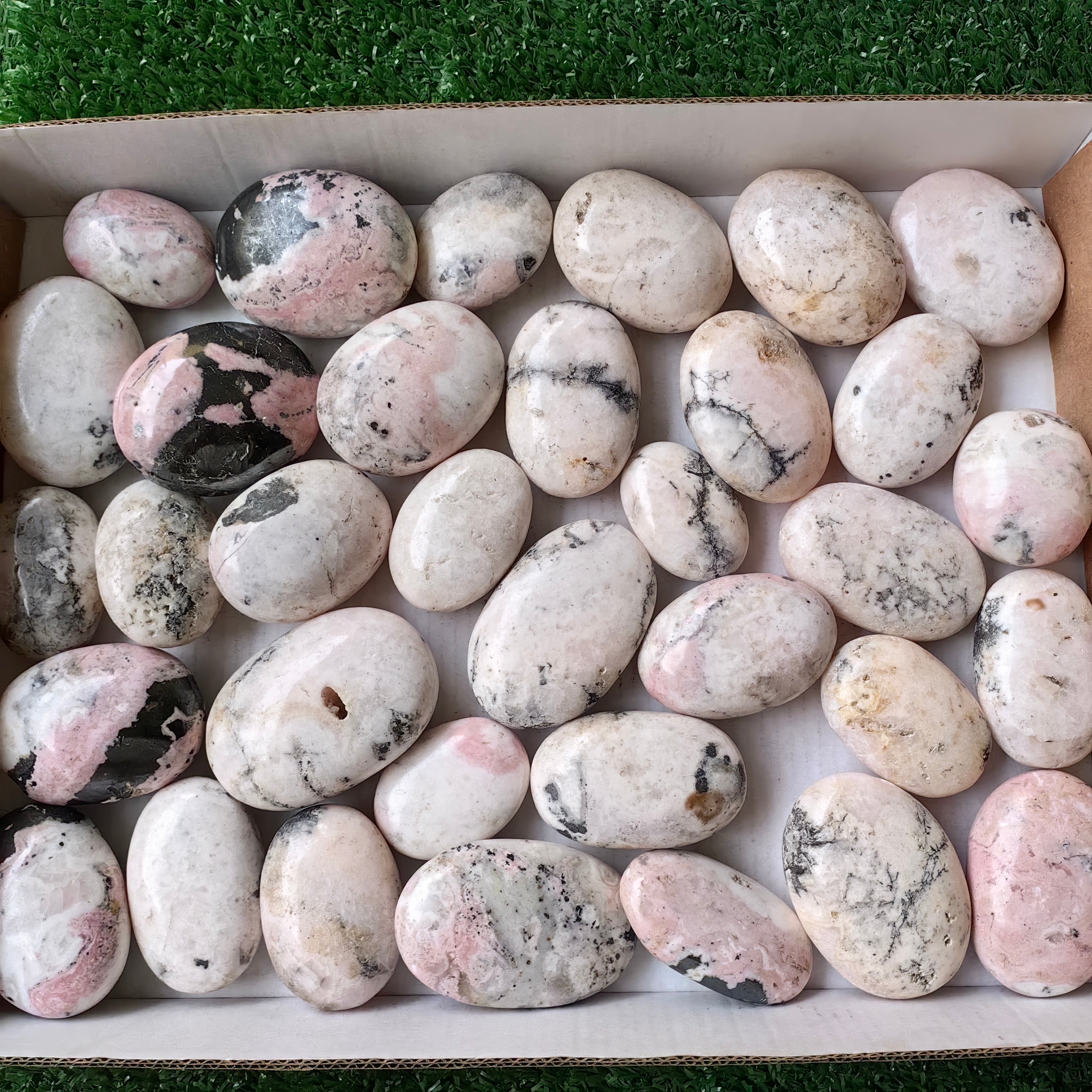 34 pc mangano calcite with rhodonite palms