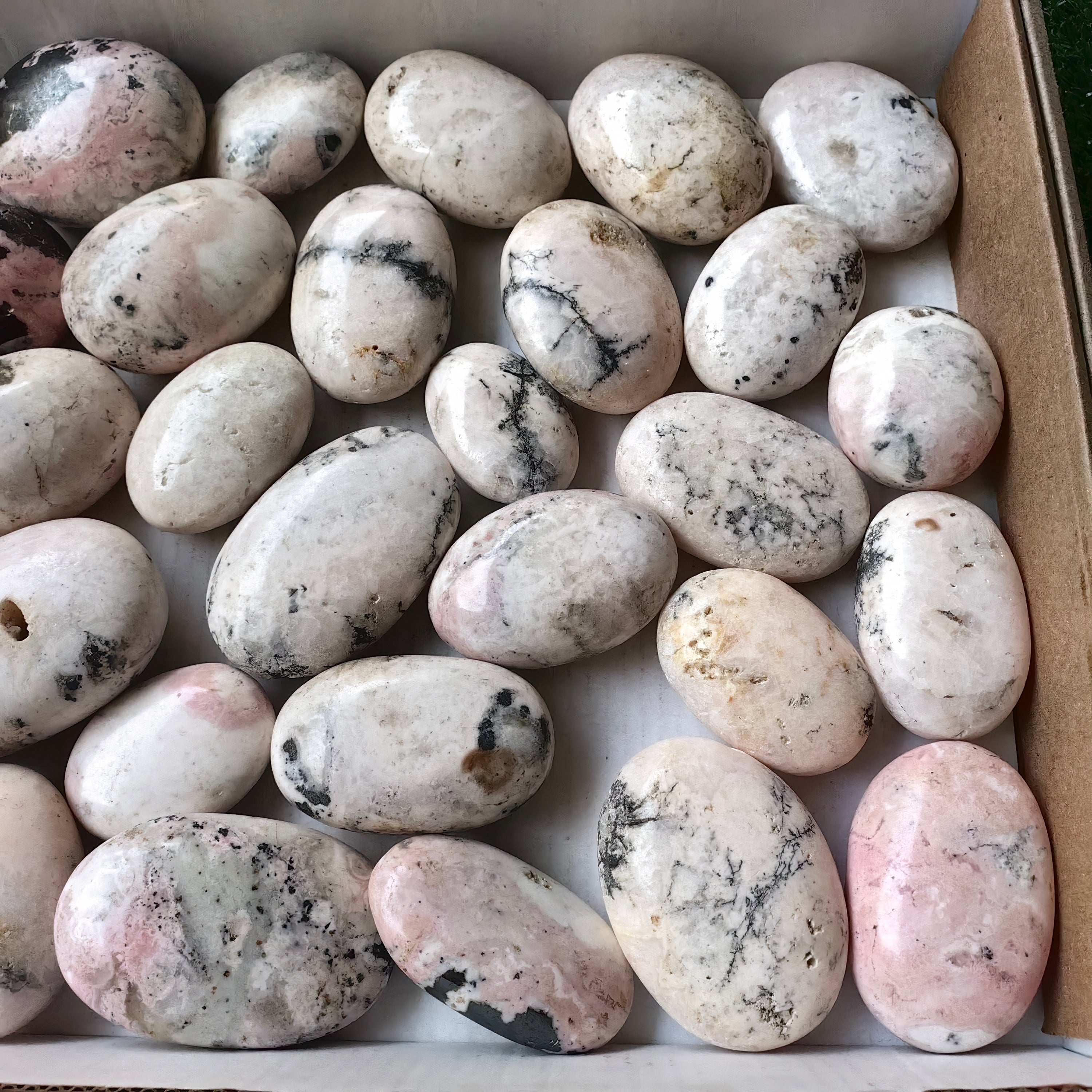 34 pc mangano calcite with rhodonite palms