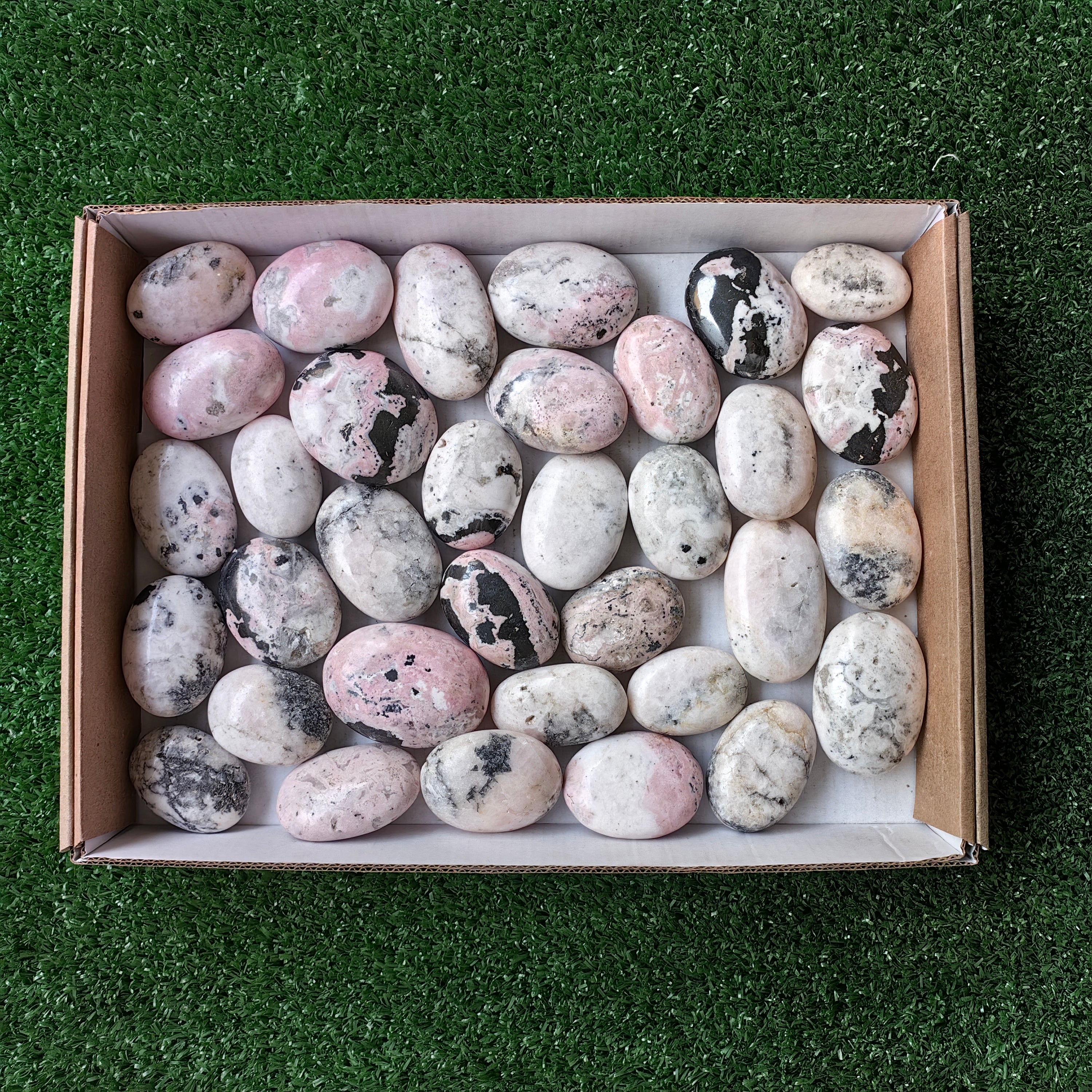 34 pc mangano calcite with rhodonite palms