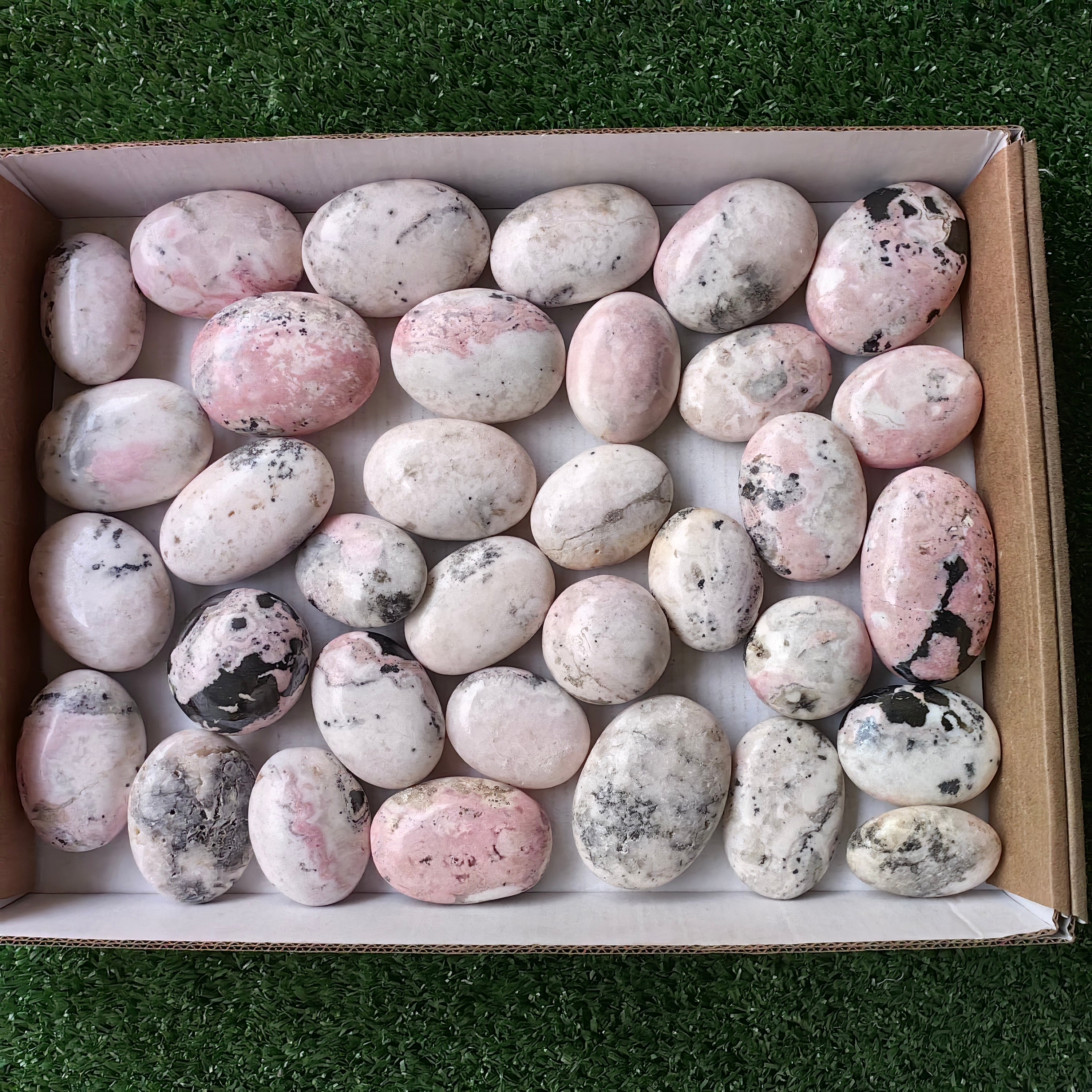 34 pc mangano calcite with rhodonite palms