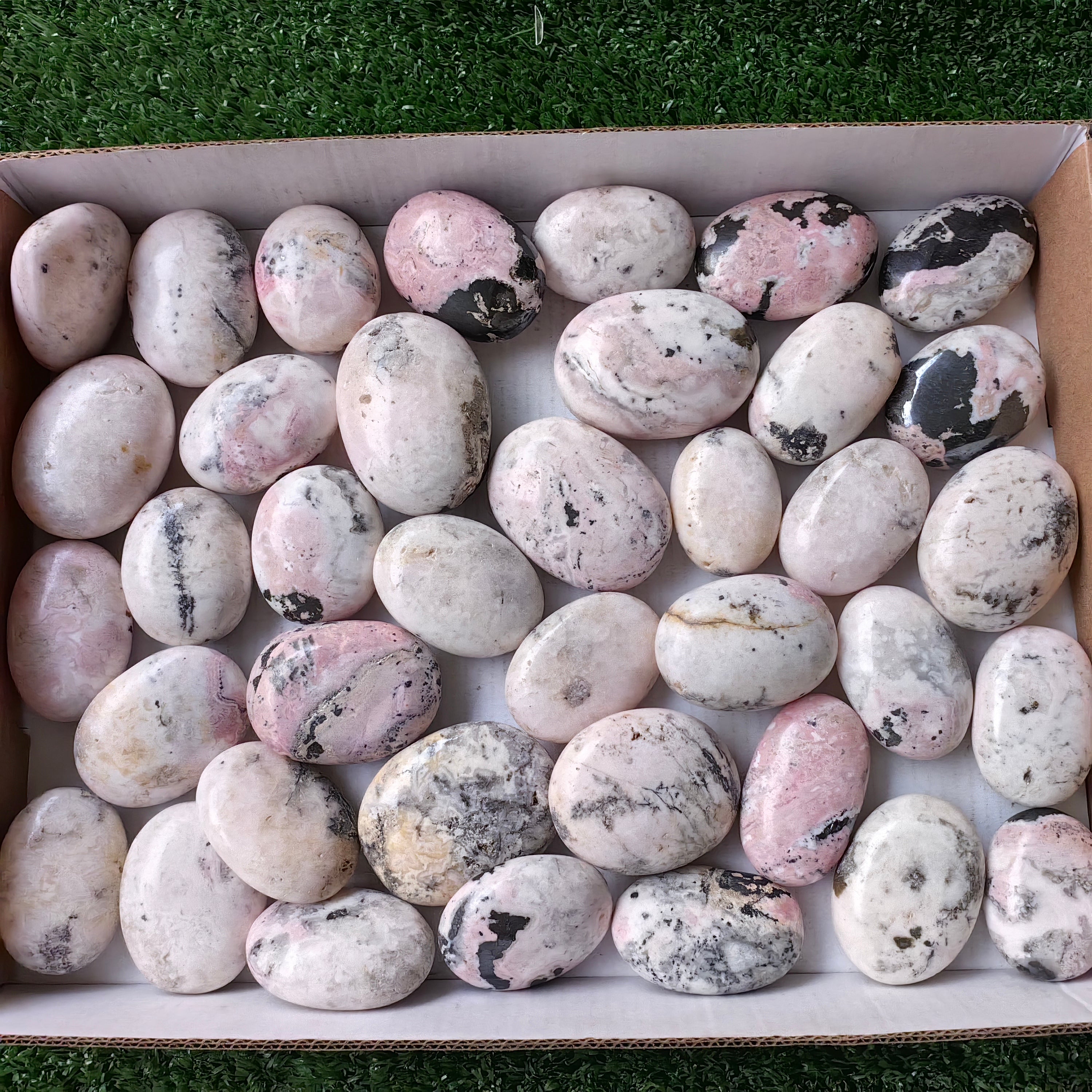 38 pc mangano calcite with rhodonite palms