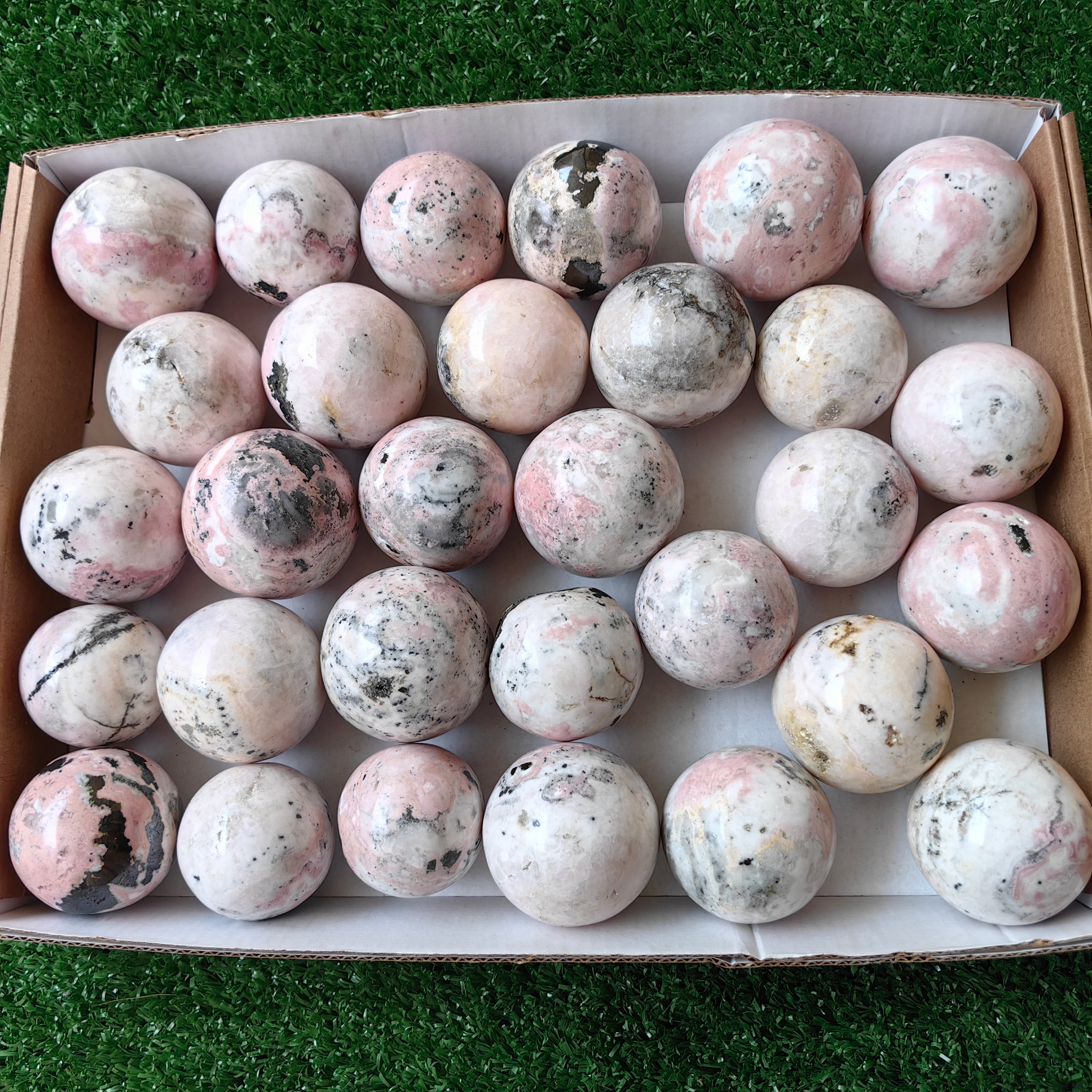 30 pc mangano calcite with rhodonite spheres