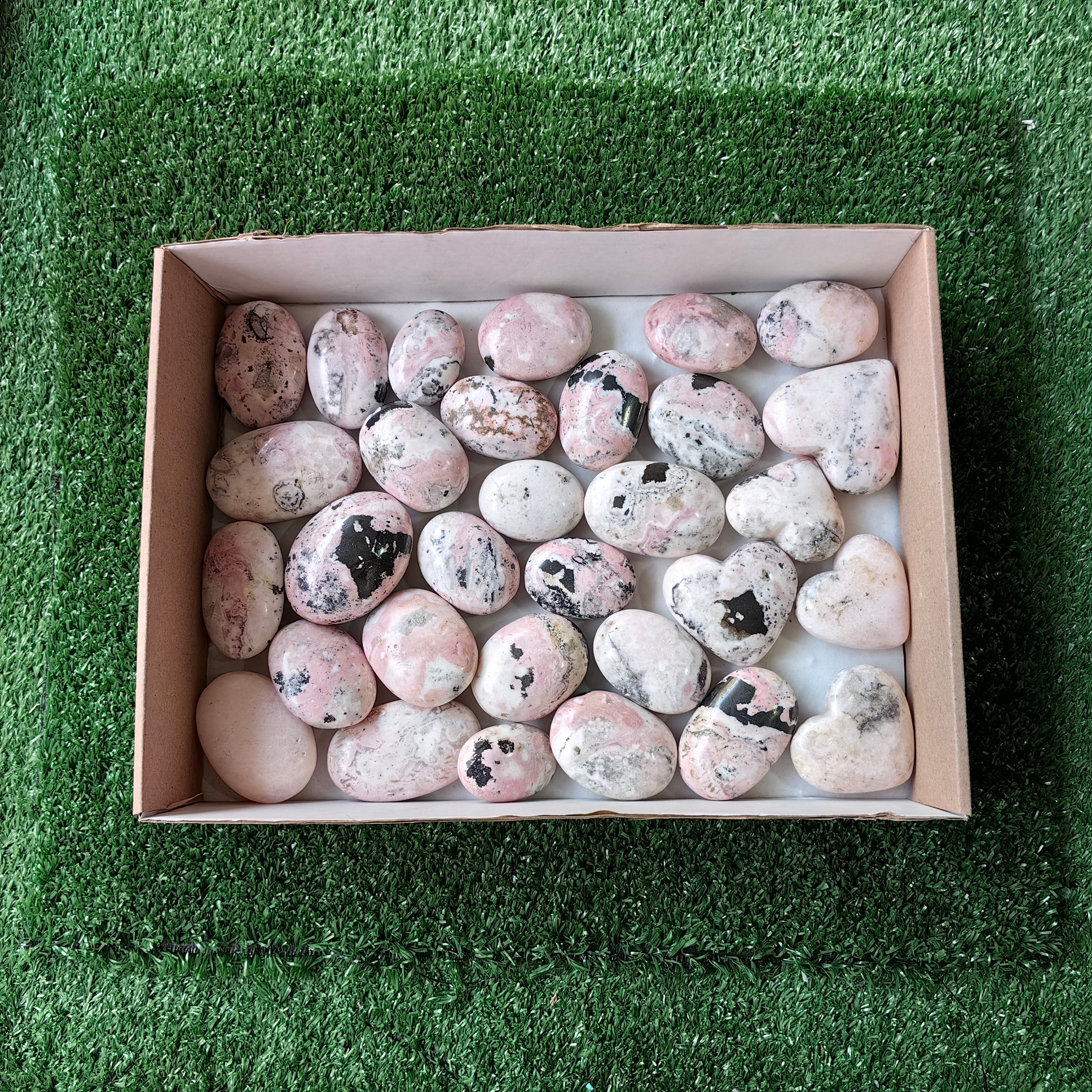 31 pc rhodonite with calcite hearts & palms