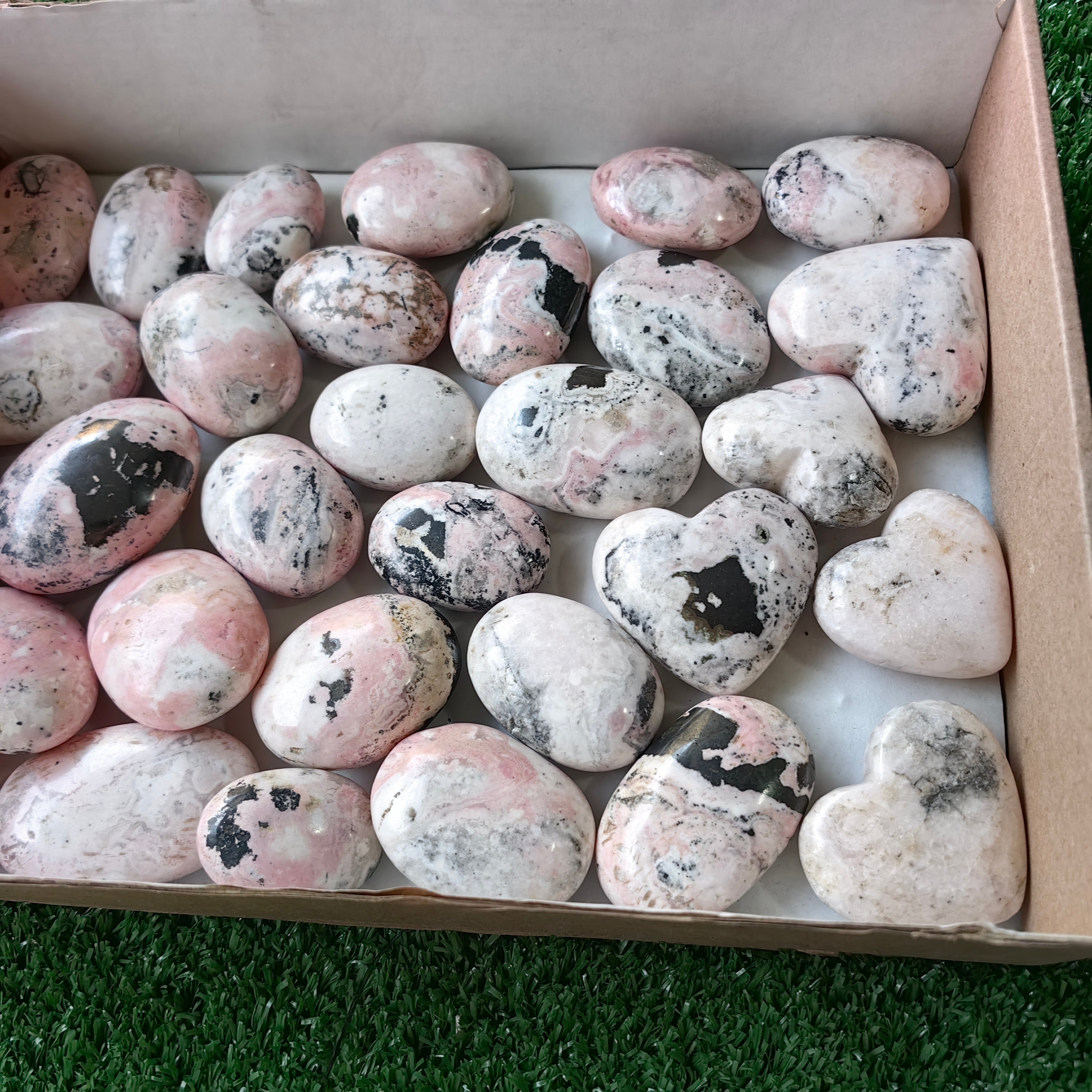31 pc rhodonite with calcite hearts & palms