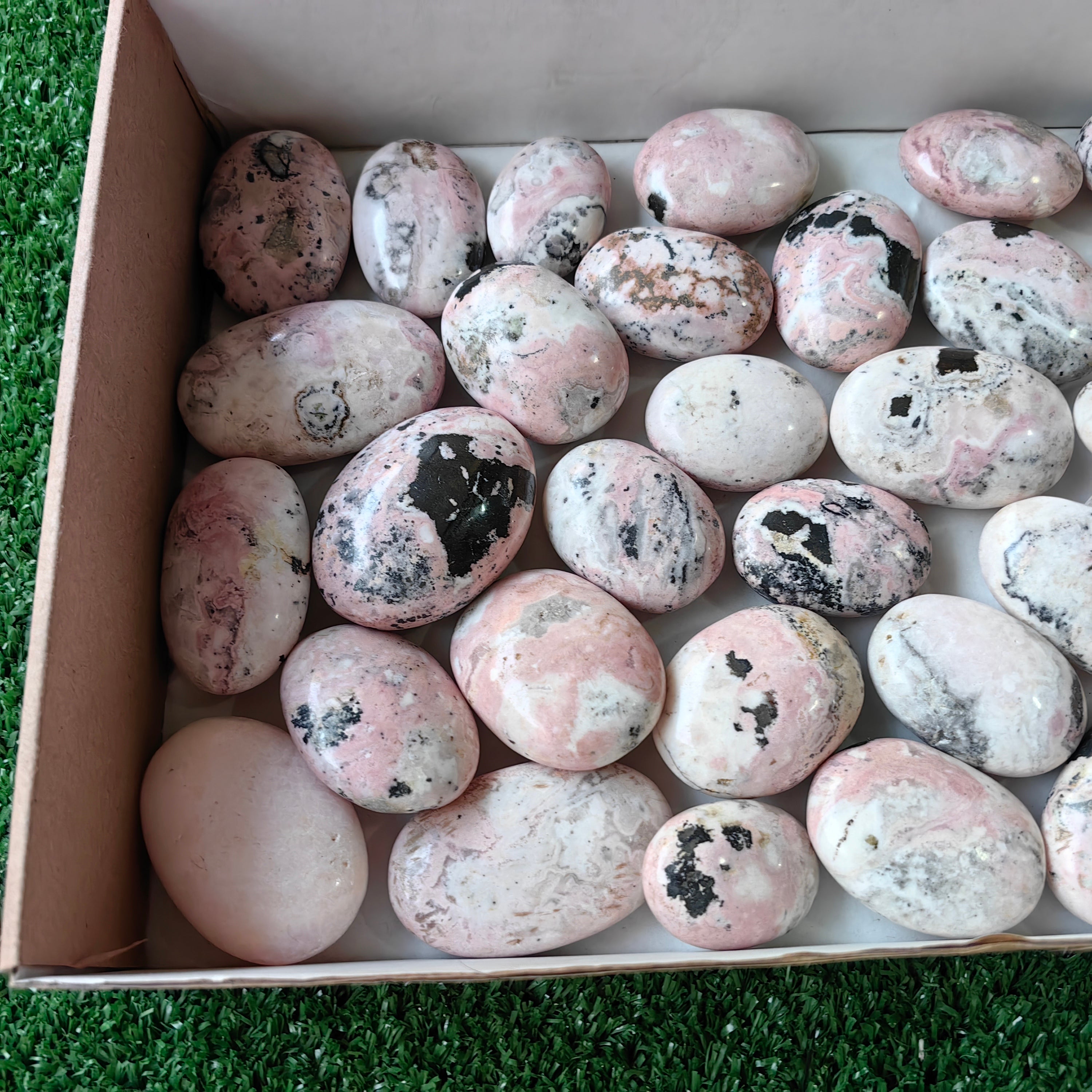 31 pc rhodonite with calcite hearts & palms