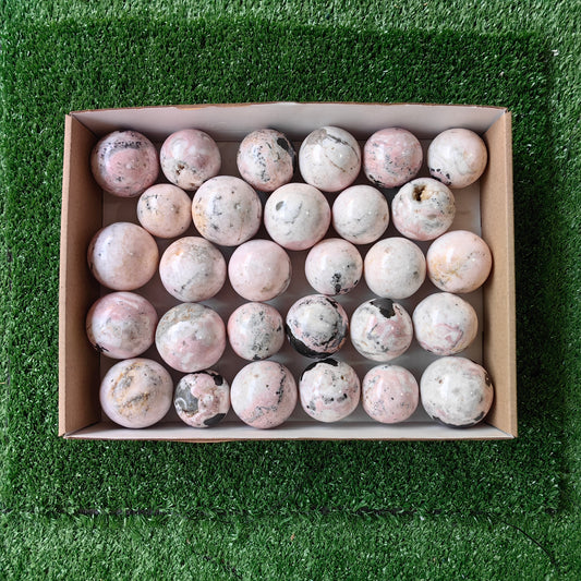 29 pc rhodonite with calcite spheres