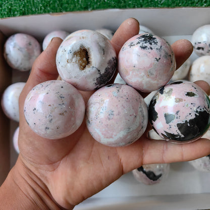 29 pc rhodonite with calcite spheres
