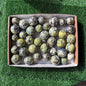 37 pc green serpentine with pyrite spheres