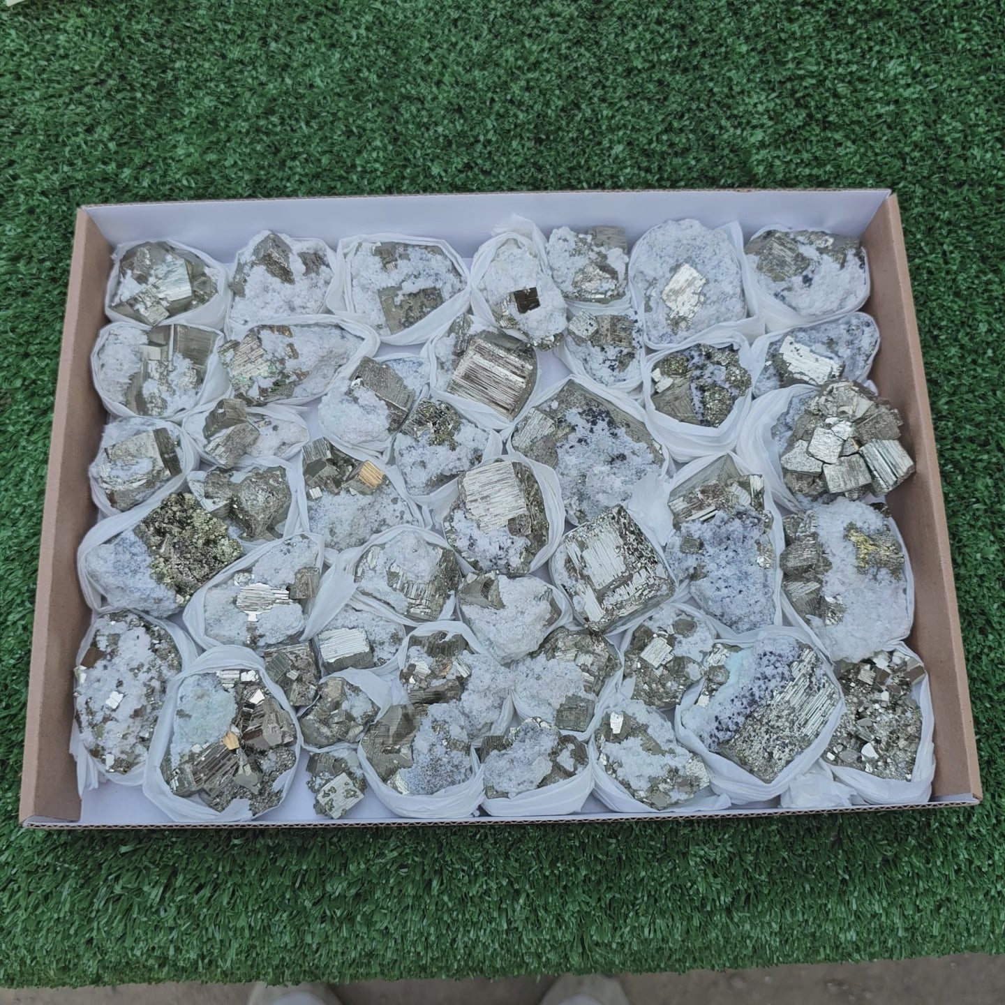 Load video: 42 pc Pyrite Cubic with calcite flourecent