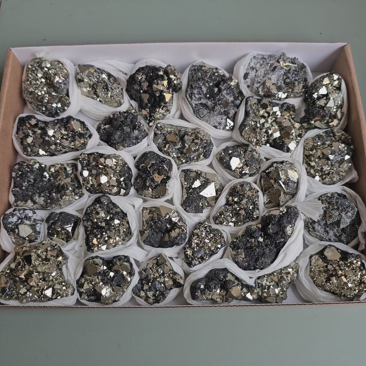 Load video: Flat pyrite Octahedral